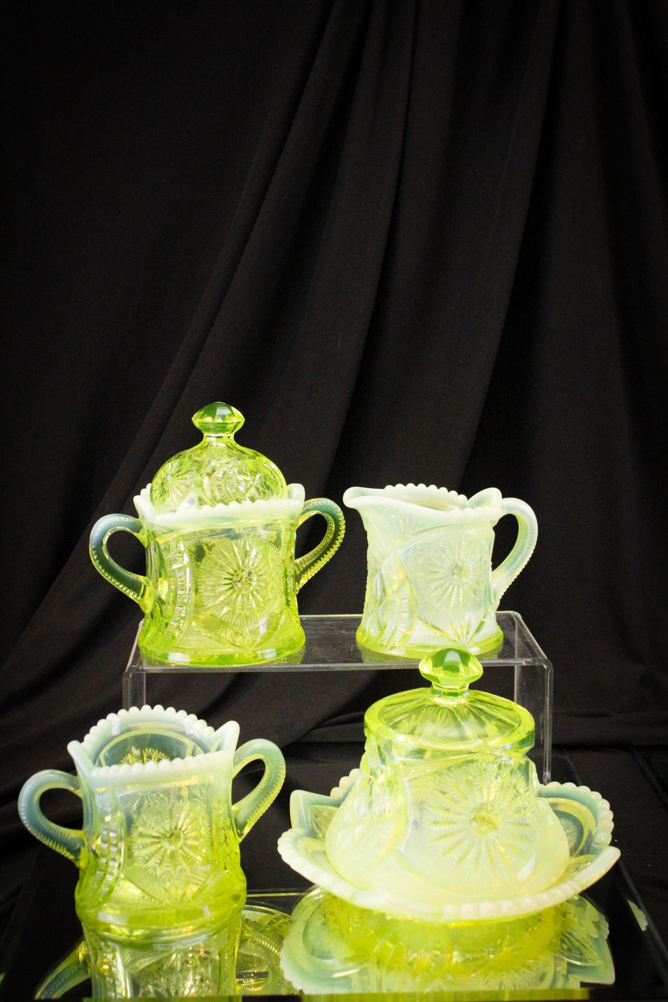 Rare Northwood Vaseline Glass Sunburst on Shield 4pc Table Set: Rare and so pretty. You just don't see it! Another finery Mother Magnum pulled out of her vault of rarities for our 2nd Anniversary auction. Lovely brilliant vaseline color and opal. Tallest measures 