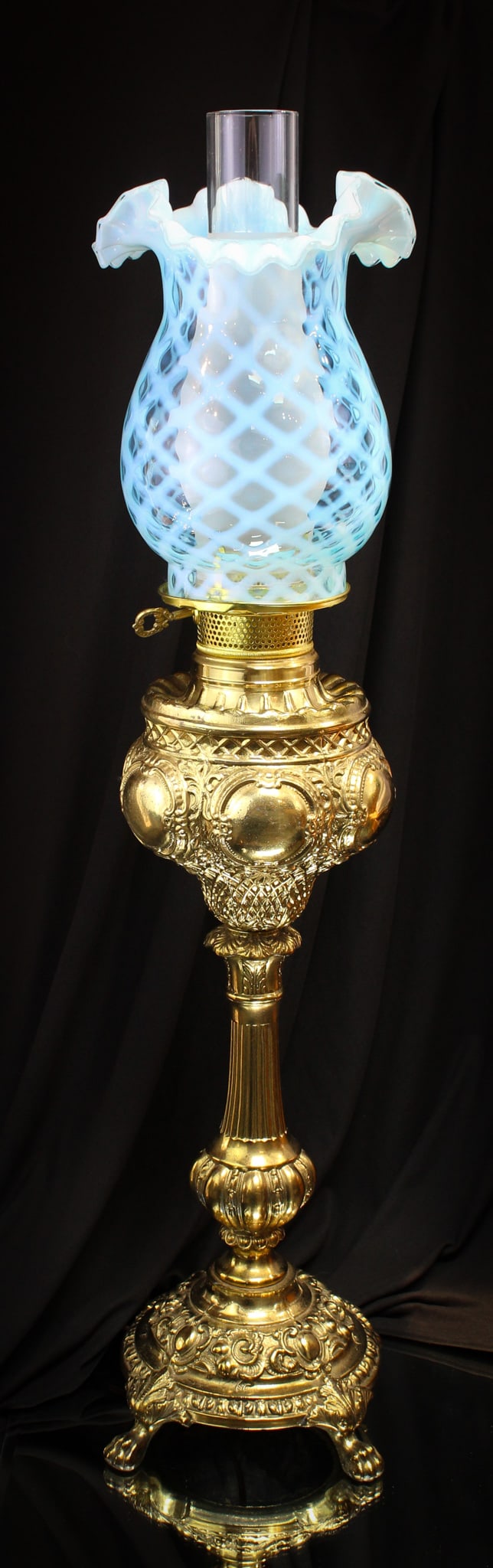 Fenton/ L G Wright Blue Opal Glass Banquet lamp: How showy is this lovely Fenton/ L G Wright banquet lamp? We think very. Lamp is completed with a blue opalescent diamond optic shade.
