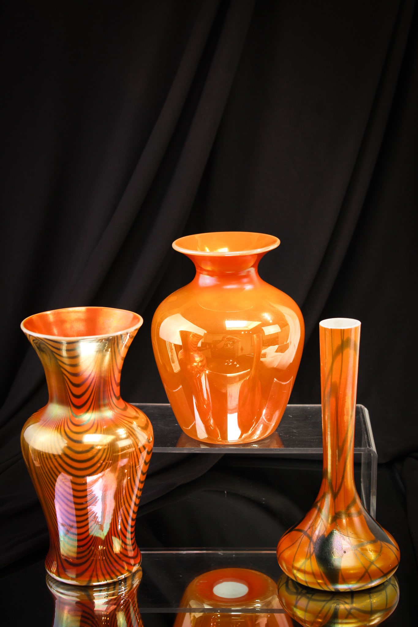 3 pc Lot Imperial Freehand Lead Lustre Glass: Select offering of three pieces of Imperial lead lustre freehand glass comprised by these vases. Fine examples of festoon, heart & vine dÃ©cor and also an undecorated example.