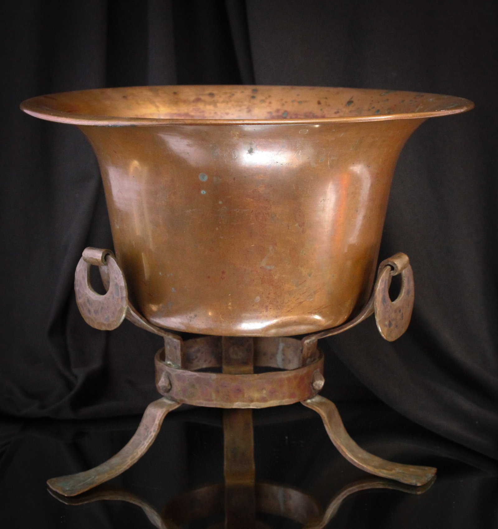 Arts & Crafts Hammered Copper Planter & Stand: Fine example of an arts and crafts period hand hammered planter complete with hand forged stand in copper. Nice example. Measures 9" by 11".