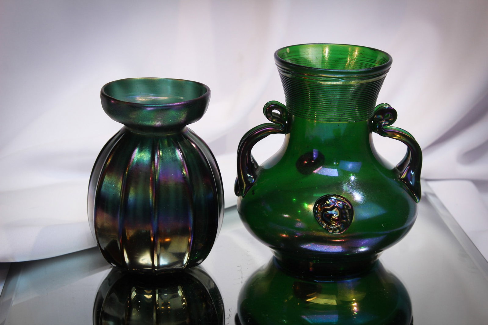 2 pc Lot Webb Victorian Art Glass Bronze: Nice pairing of two unique Webb Bronze ware Victorian art glass vases. One with applied handles and the other with applied lion prunts. Nice!