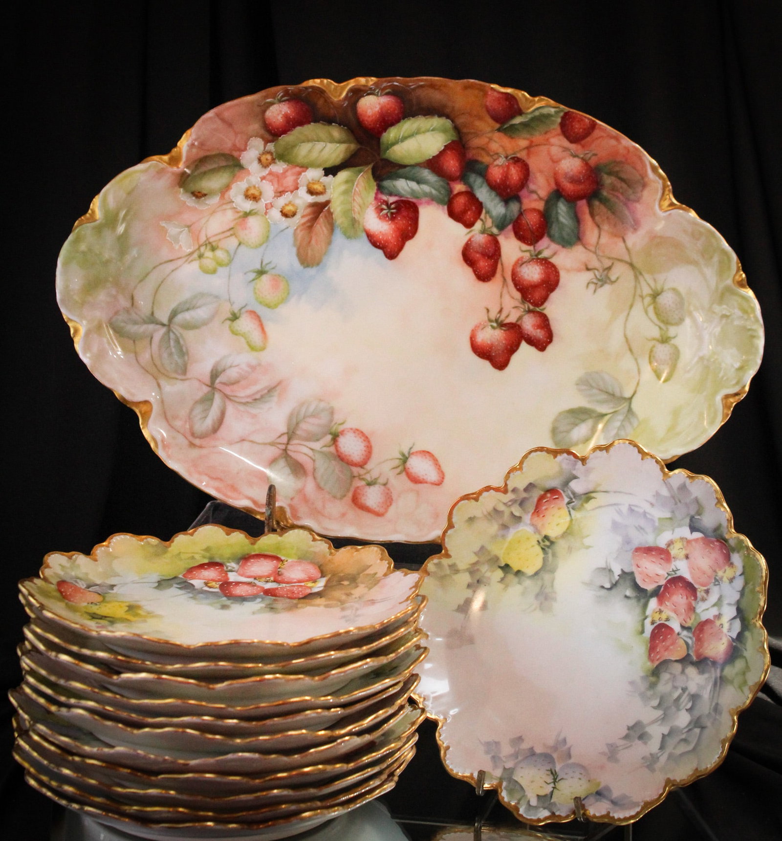 13 pc Haviland France Hand Painted Porcelain Strawberries Dessert Set: Fantastic 13 piece complete set Haviland France Porcelain hand painted strawberries dessert set. Set is complete with serving plater and 12 plates. Largest measures 16" by 2".