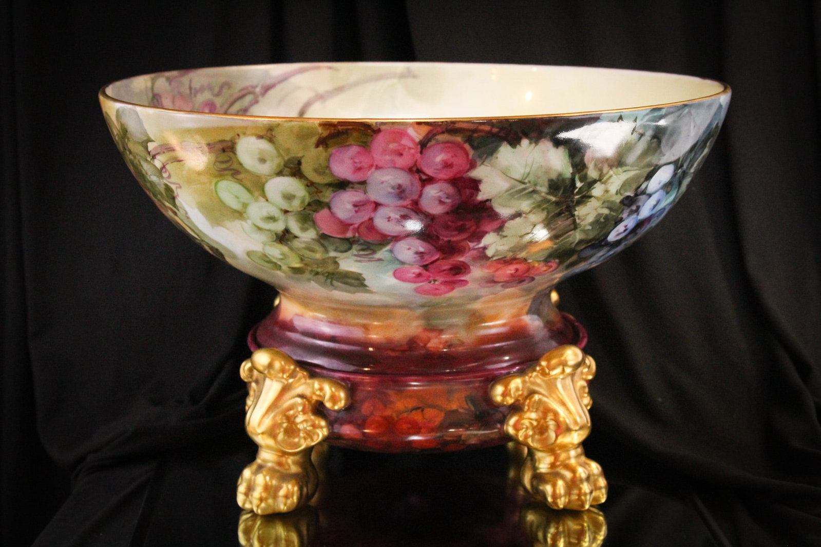 T & V Limoges Hand Painted Porcelain Punch Bowl & Base: Wonderful grape adorned 15" punch bowl signed "T & V, Limoges". This bowl is complete with base with matching decoration. Fine example of hand pianted porcelain. It measures 9" by 15" complete on base