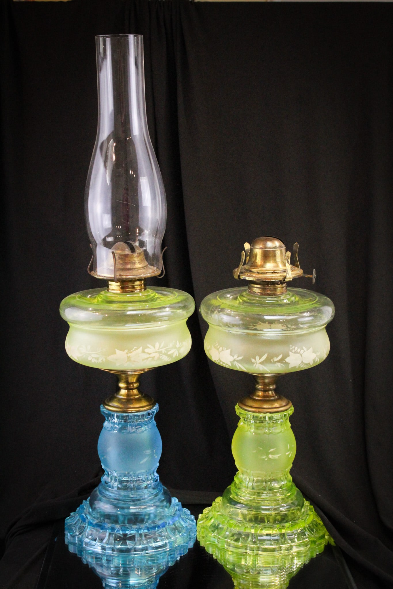 2 pc Lot Victorian Vaseline & more Oil Lamps: Select offering of two great Victorian period oil lamps. One in all vaseline. The other with vaseline font and blue base with enameled dÃ©coration.
