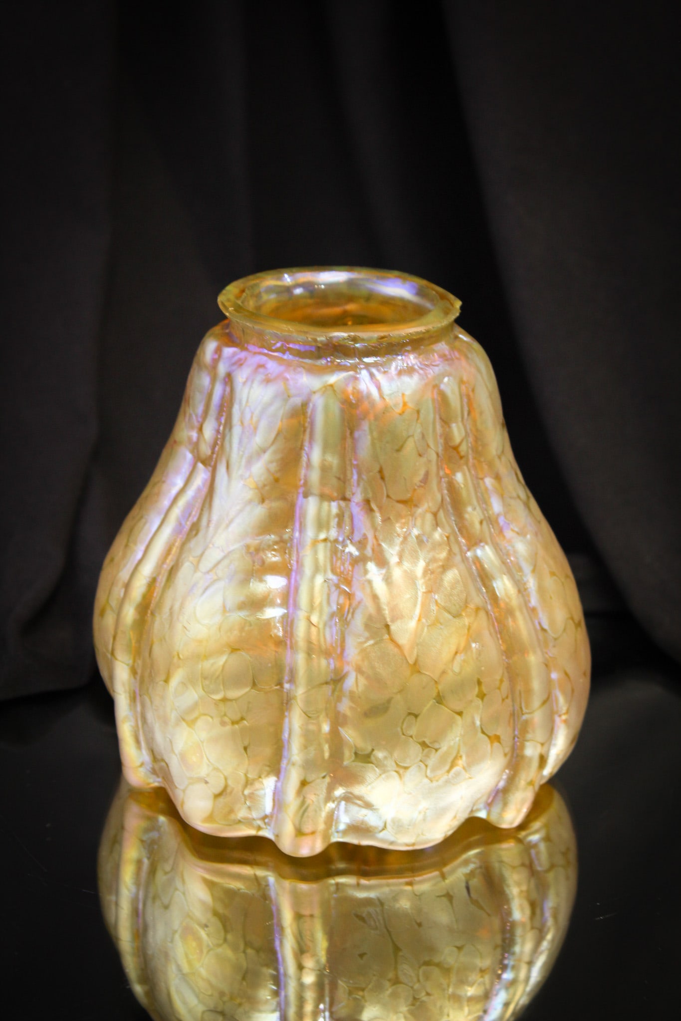Loetz Gold Irridescent Art Glass Shade: Gorgeous attributed to Loetz, this shade is very unusual. Nice irridescence and interesting pattern. Shade is segmented and freeblown. Shade has a 2 1/4" fitter and stands 4 1/2" tall. Nice!