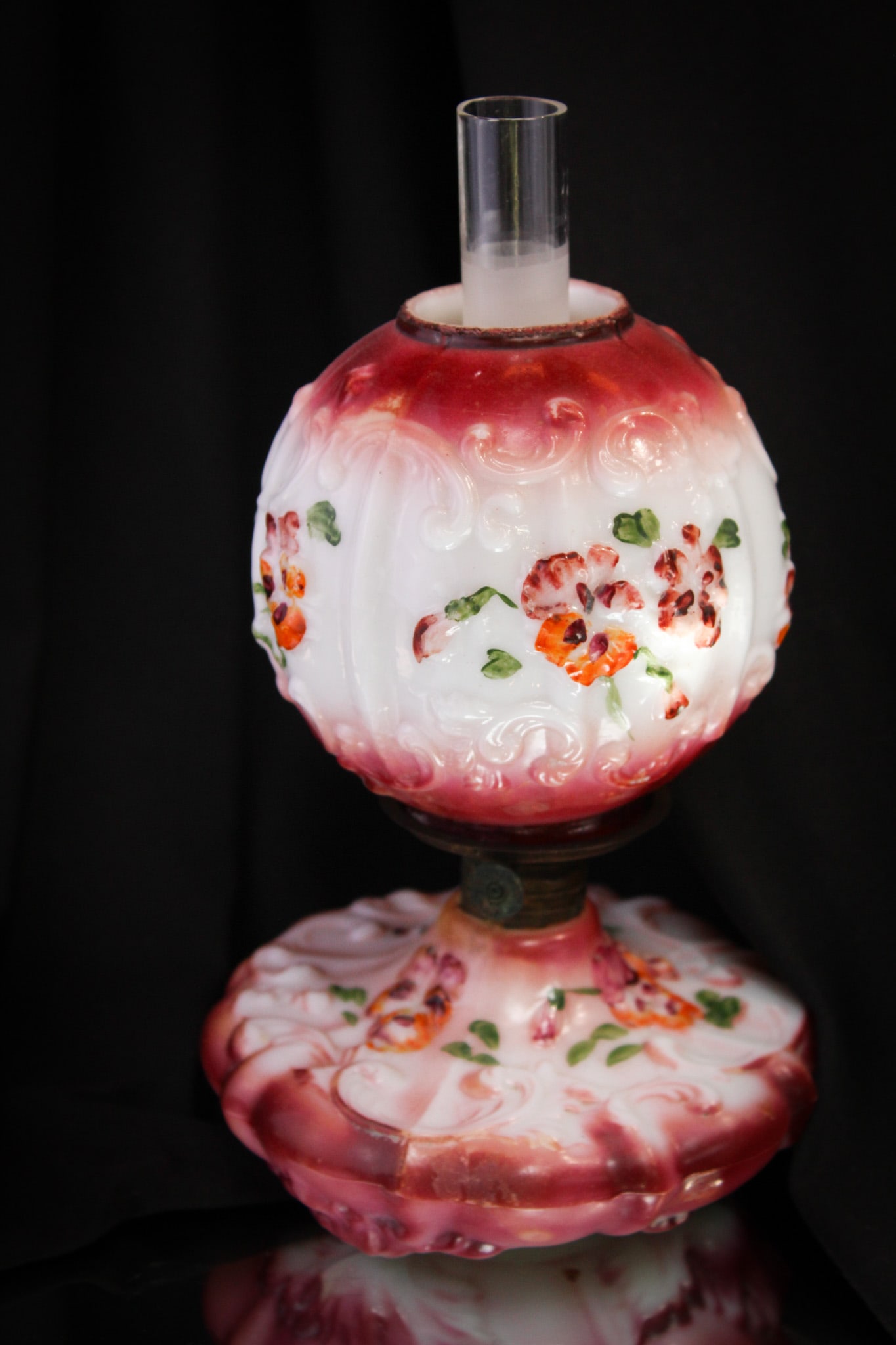 Victorian Embossed Scrolling Miniature Oil Lamp: Here's a charming opal glass embossed floral and scrolling miniature oil lamp from the Victorian period. Original enameled decoration. Very nice.