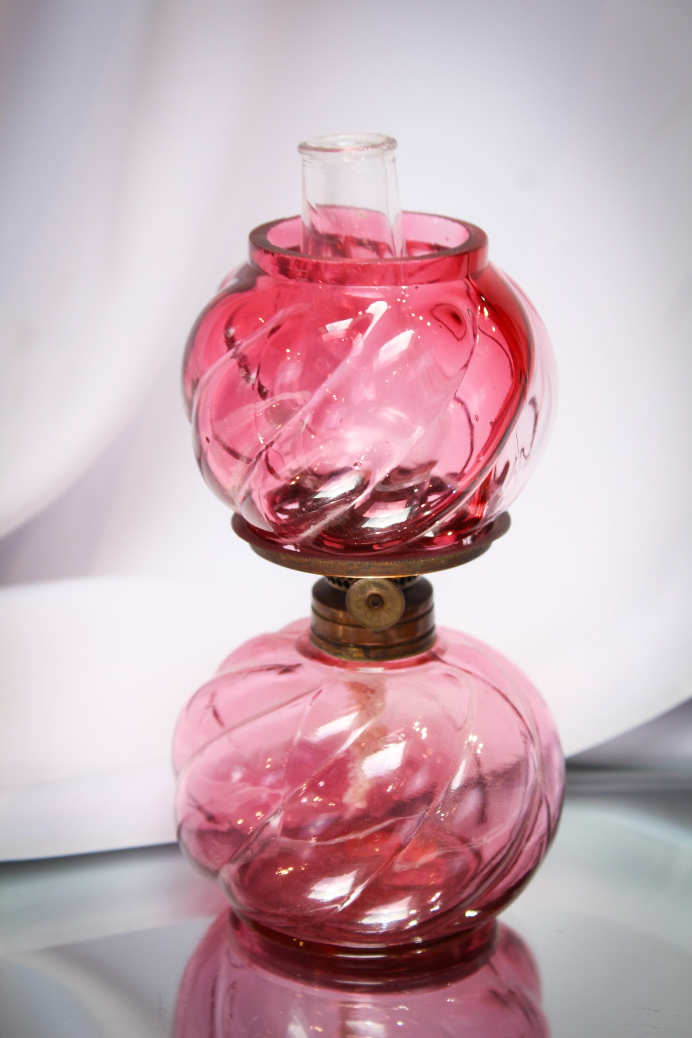 Northwoood Parian Swirl Cranberry Miniature Victorian Oil Lamp: Seldom found in cranberry glossy, this little lamp was made by Northwood in the "Parian Swirl" pattern.