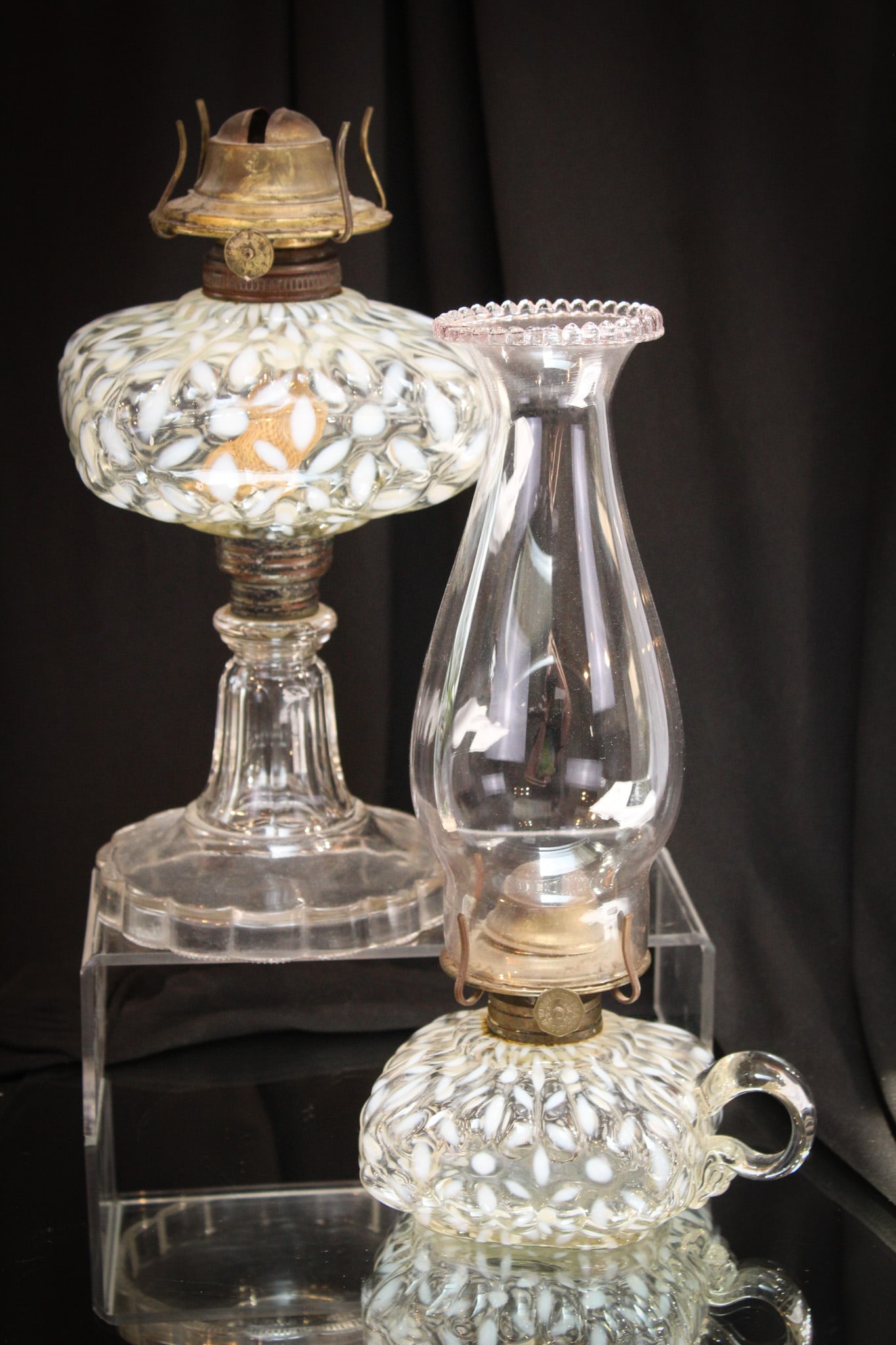 2 pc Lot Hobb's Opalescent Snowflake Oil Lamps: Nice pairing of two Hobb's opalescent "Snowflake" pattern Victorian oil lamps. One stand and one flat finger example.