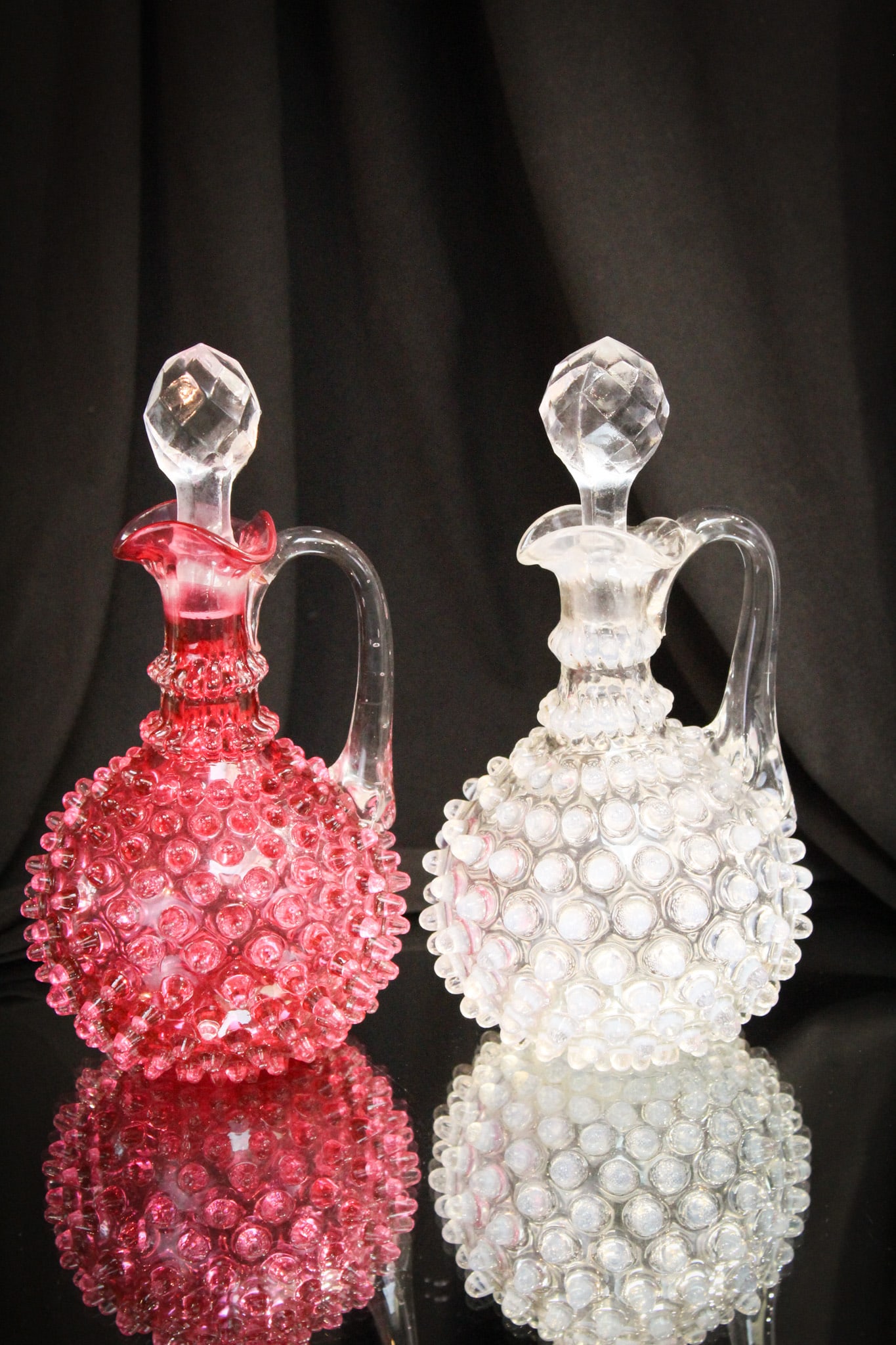 2 pc Lot Hobb's Hobnail Victorian Glass Cruets: Great offering of two Victorian Hobb's hobnail cruets. One cranberry and one opalescent.