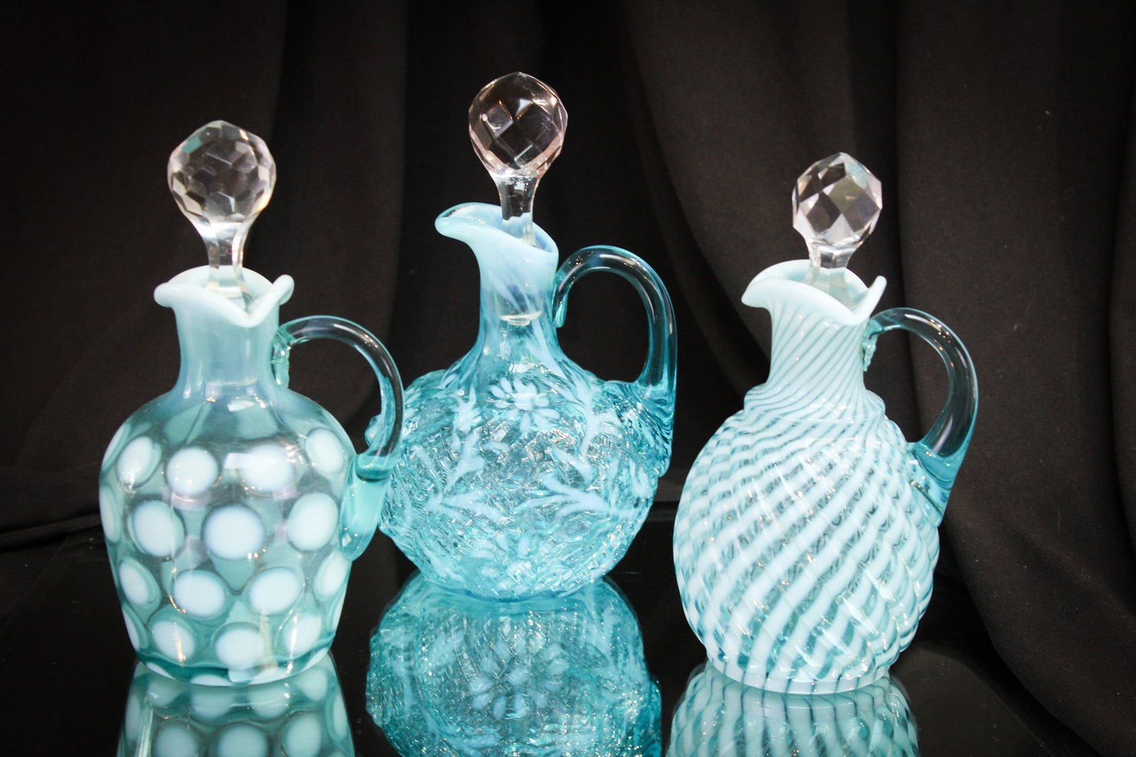 3 pc Lot Blue Opalescent Victorian Glass Cruets: Great selection here in this lot. Three beautiful Victorian glass cruets. Examples to include a "Coinspot", a "Daisy & Fern" with apple blossom mold and a "Reverse Swirl."