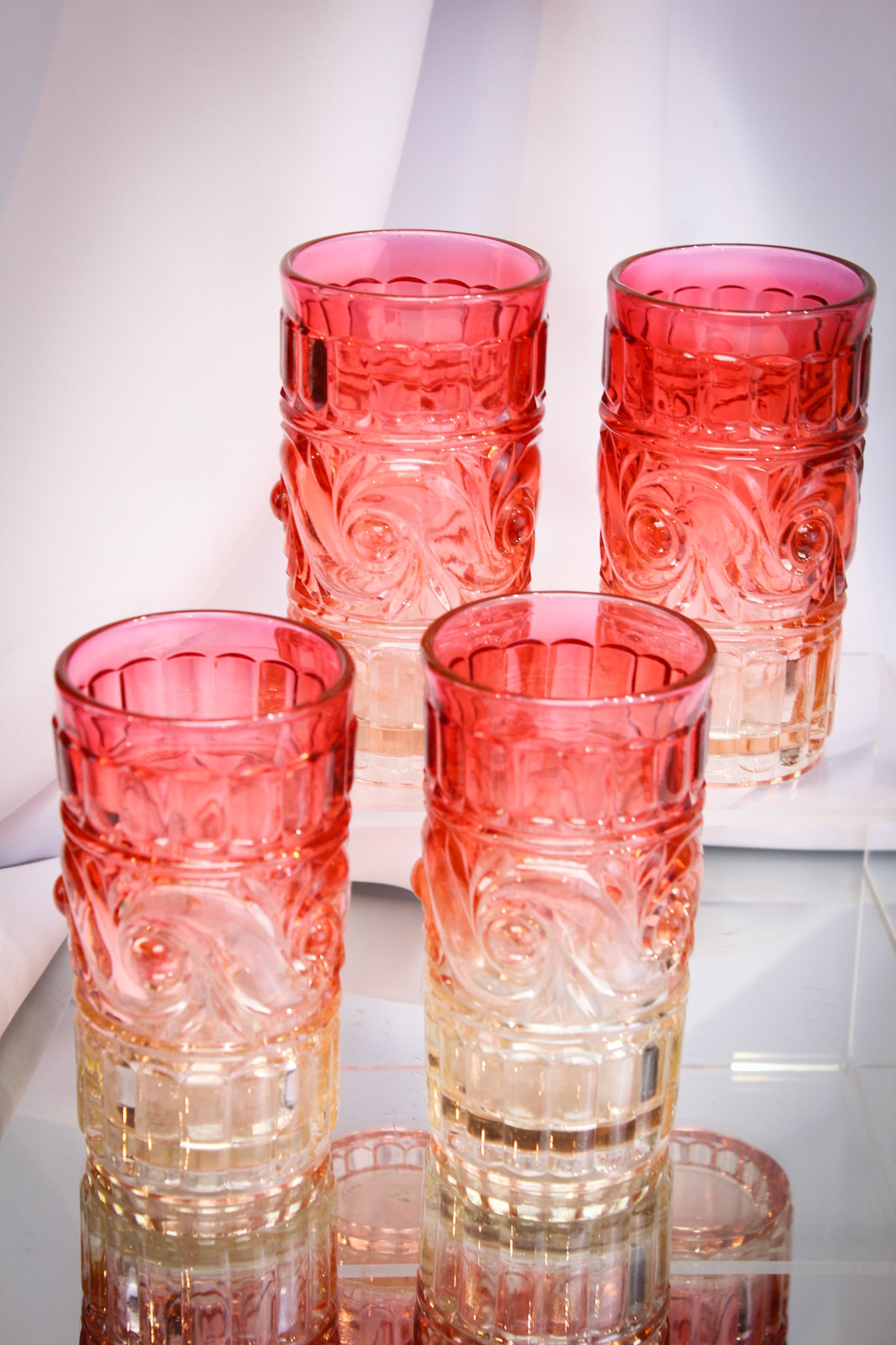 4 pc Lot Baccarat Rose Tiente France Glass 4 3/4" Tumblers: Marverlous group of four Baccarat Rose Tiente tumblers. Each signed "Baccarat" and "Depose" on the base.