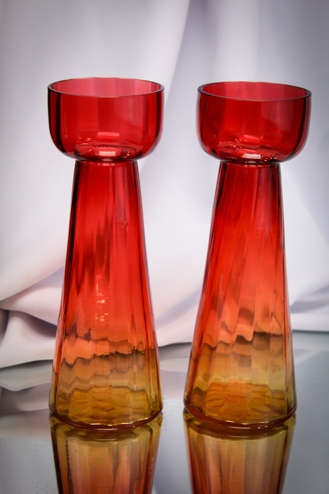 Pair Victorian Amberina Rib Optic Hyacinth Vases: Seldom found amberina rib optic pattern Victorian glass hyacinth vases. The best color in each. Super to find let alone a pair!