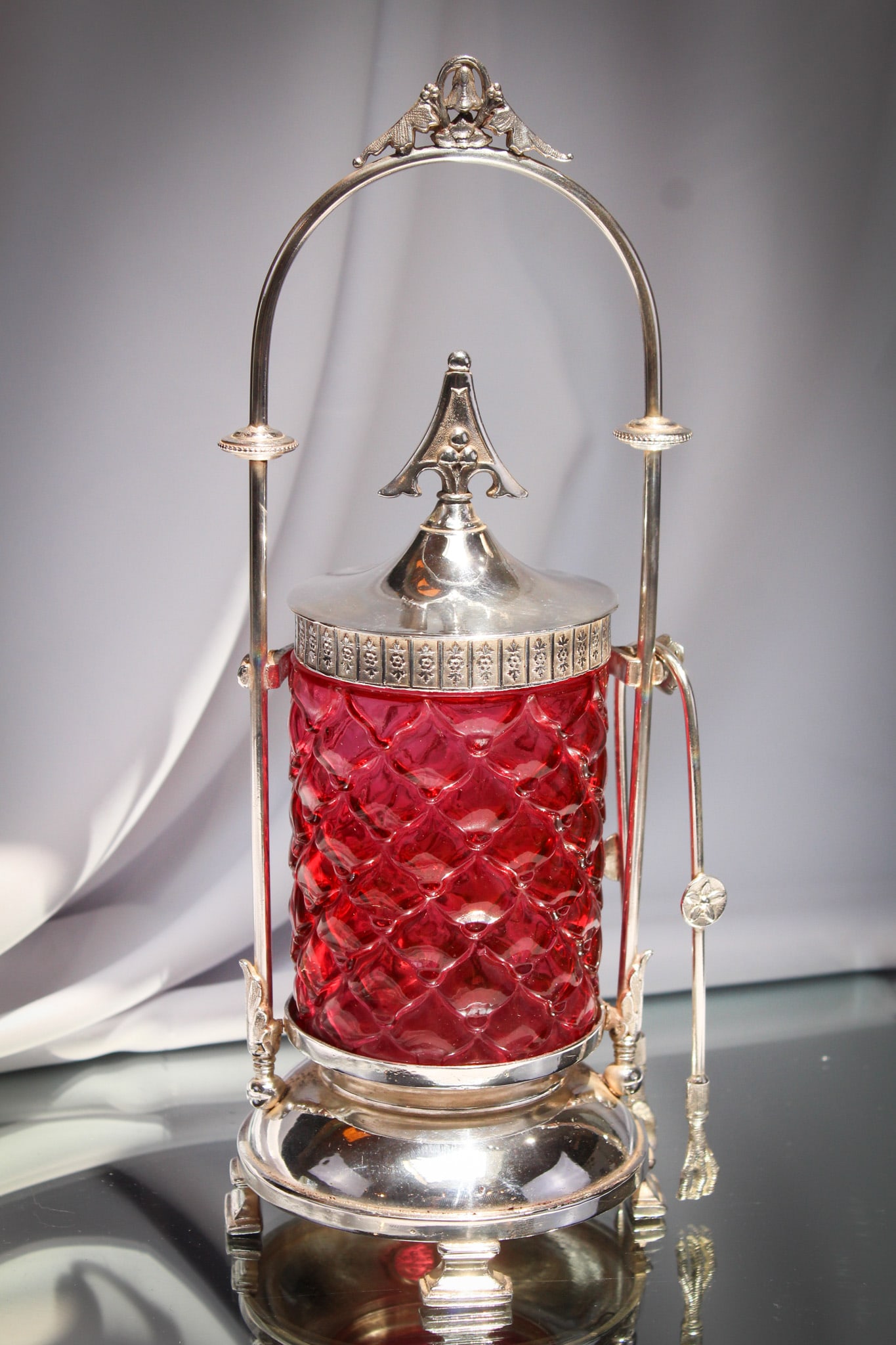Rare Victorian Silverplate Cranberry Consolidated Pickle Castor: Fine example of a Victorian silverplate pickle castor. This one has a signed "Simpson Hall, and Miller" silverplate frame complete with original cranberry "Cone" pattern Consolidated insert. Nice!