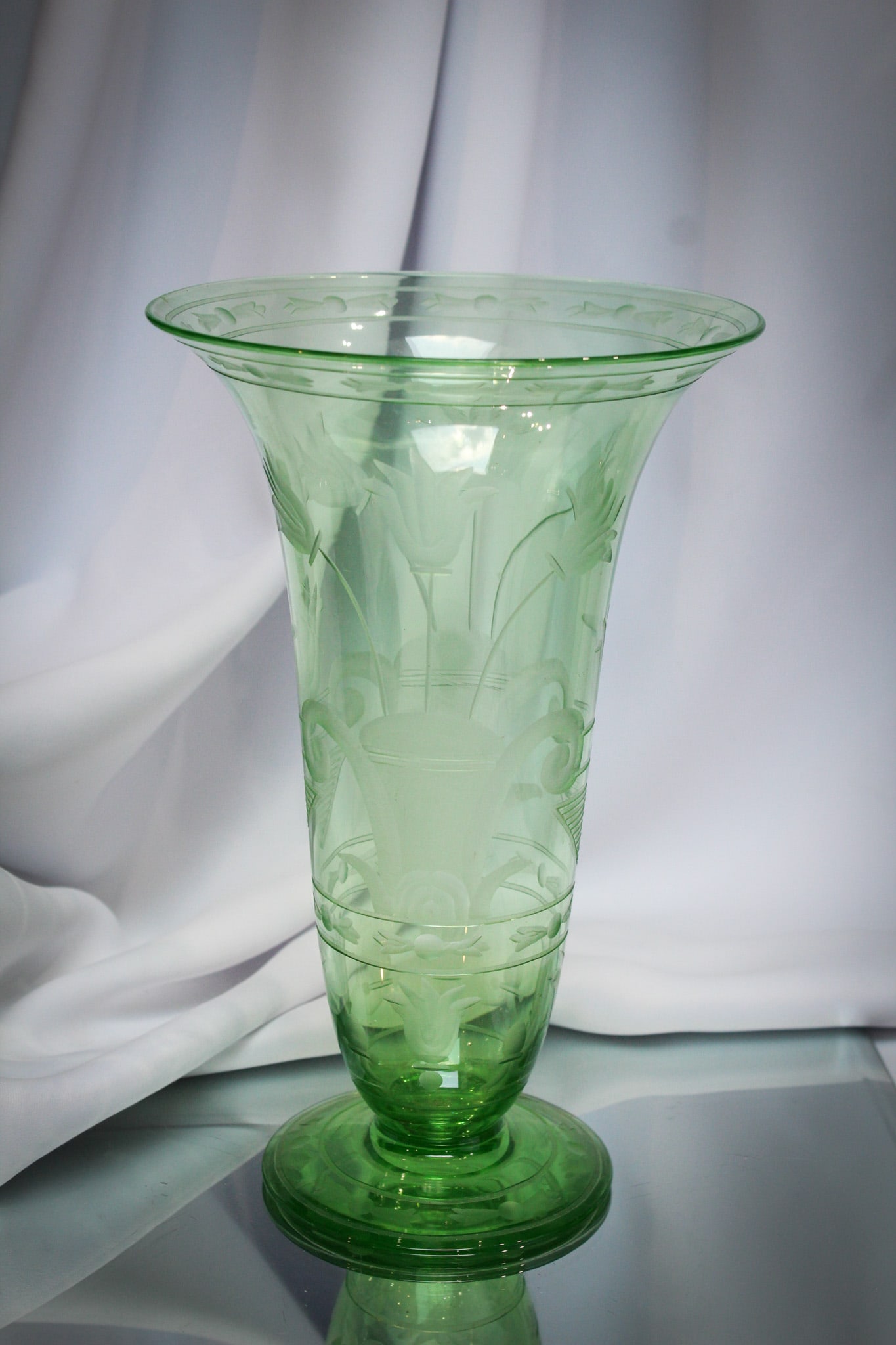 Pairpoint Green Osiris 10" Vase: Beautiful engraved Pairpoint green glass vase in the "Osiris" pattern. Very nice example with the best coloring.