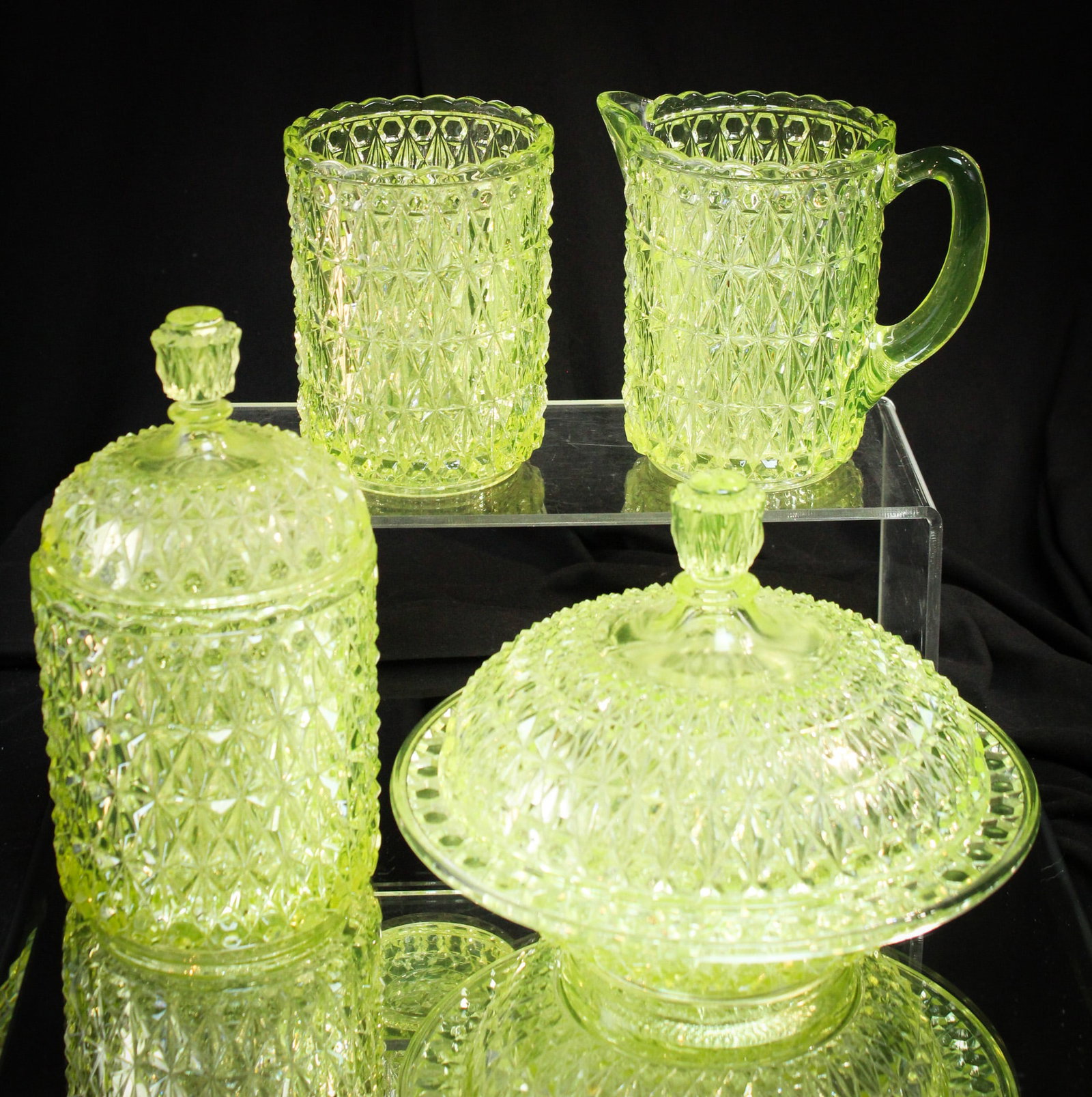 Central Glass Victorian 4 pc table Set in Vaseline Victorian: Super find is this Victorian vaseline glass table set by Central Glass. Vasies stand up and take notice of this fine and hard to find complete set!