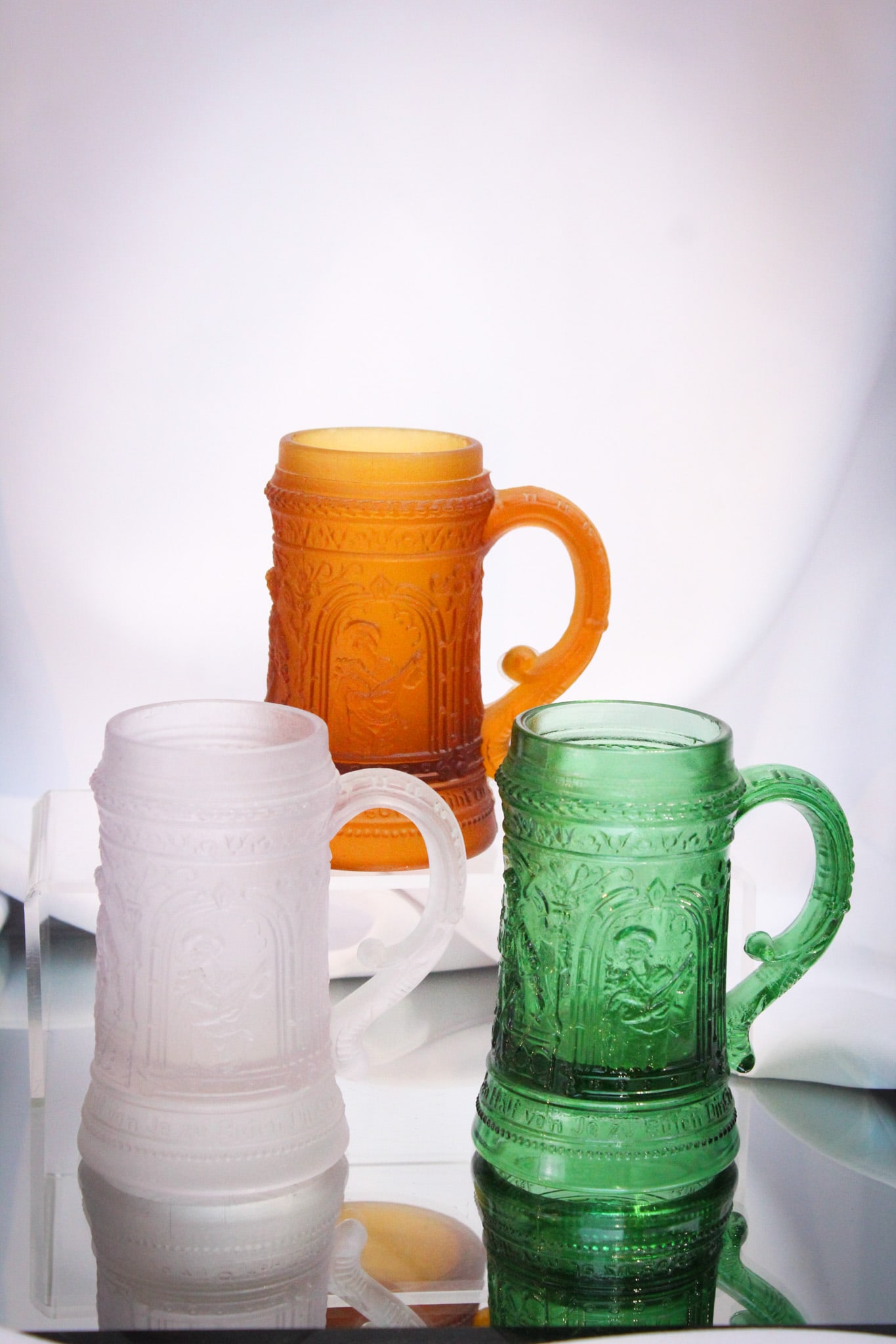 3 pc McKee Glass Lot Serenade Mugs: Select offering of three "Serenade" pattern mugs in various colors.