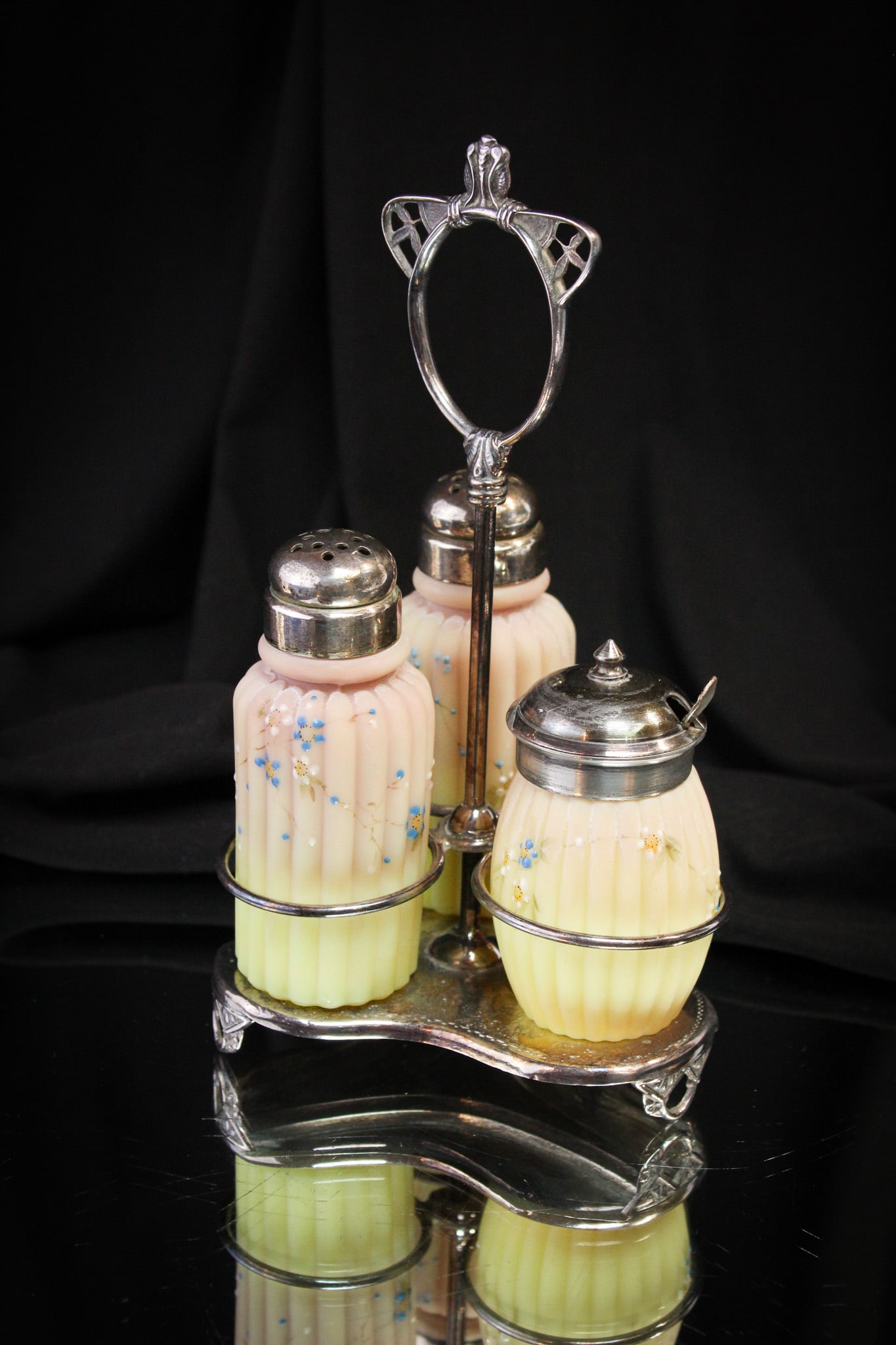Pairpoint Silverplate Mt. Washington Glass Condiment Castor: Great find here in this signed "Pairpoint" silverplate holder complete with shakers and mustard jar by Mt. Washington glass.