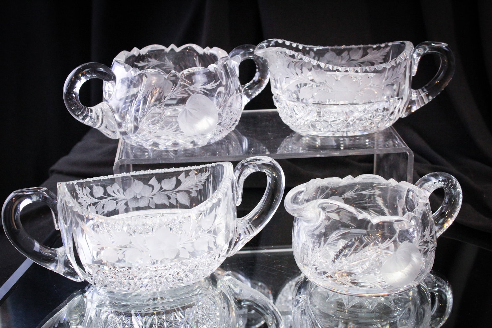 2 pc Lot Hawkes & More Brilliant Cut Glass Creamers & Sugars: Nice pairing of two fine sets of American brilliant cut glass creamers and sugars. One set is Hawkes gravic cut strawberry. The other cut and engraved.