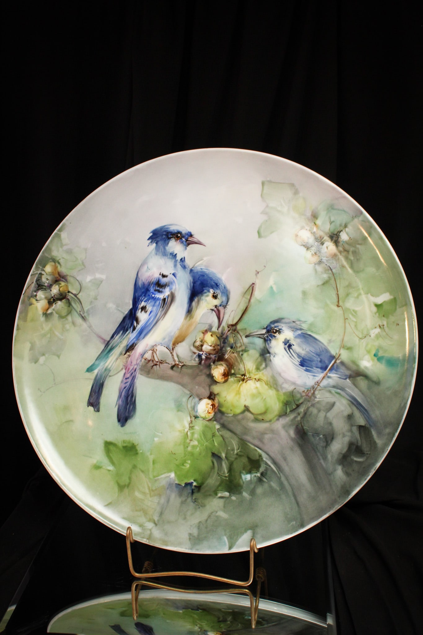 T & V Limoges 18" Hand Painted Porcelain Blue Birds Charger: Stunning hand painted porcelain charger signed "T & V, Limoges" decorated with bright blue birds in branches. Incredible life like depiction with great detail. Measures a large 18" in diameter.