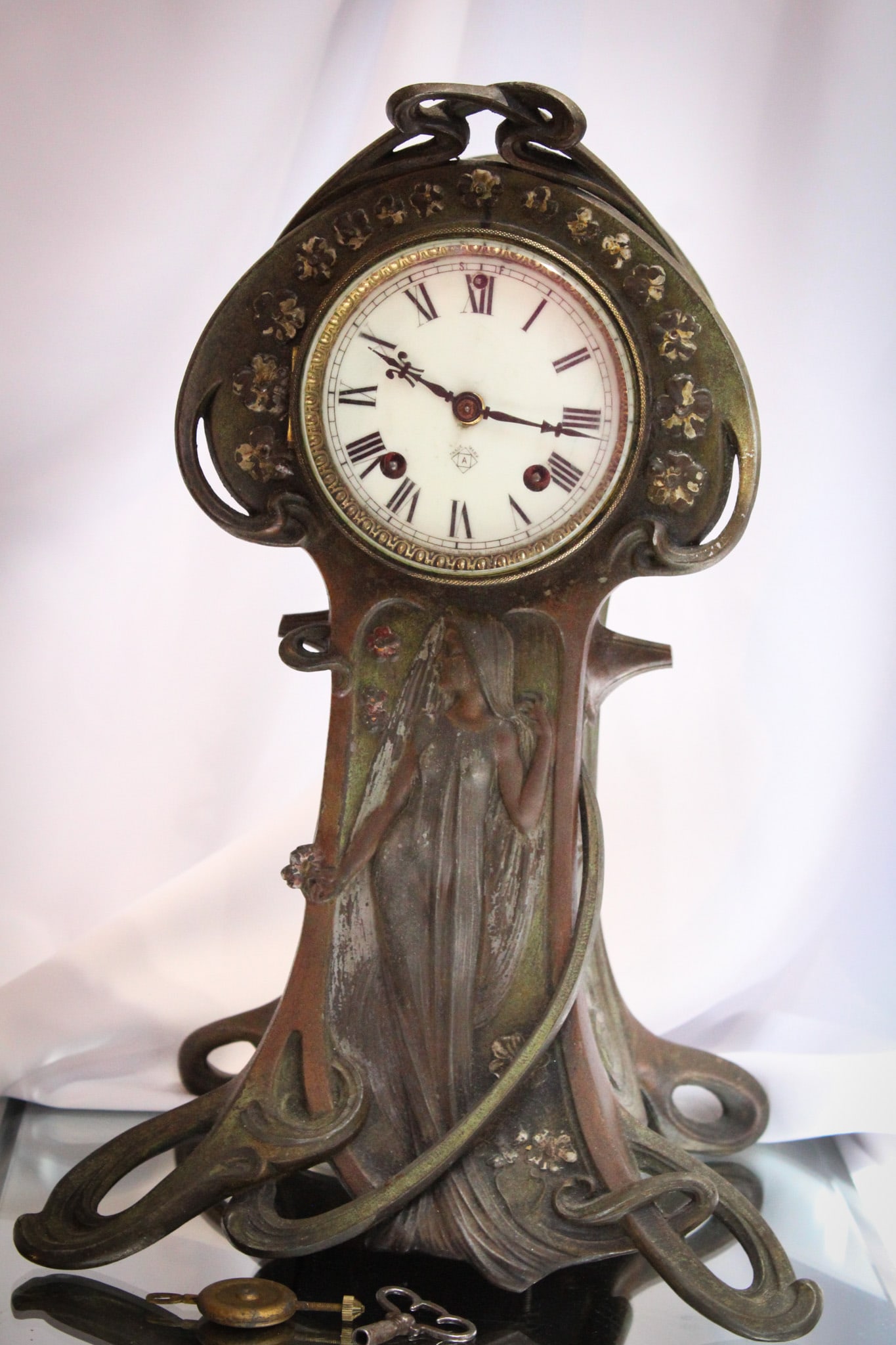 Antique Art Nouveau Ansonia Metal 16" Clock: Beautiful Art Nouveau antique Ansonia clock. Clock measures 16" tall. Clock is untested.