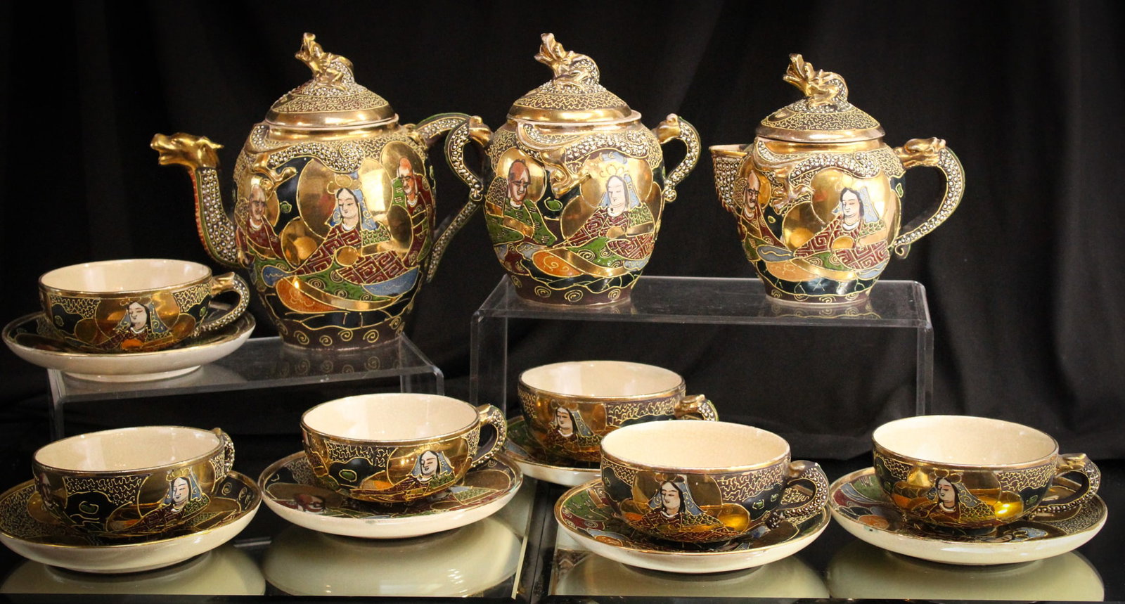Satsuma Porcelain Dragon 15 pc Tea Set: Super offering of this beautiful set of Satsuma porcelain tea set featuring a total of 15 pieces. Set is compplete with dragon finials and spouts. Wonderful offering.