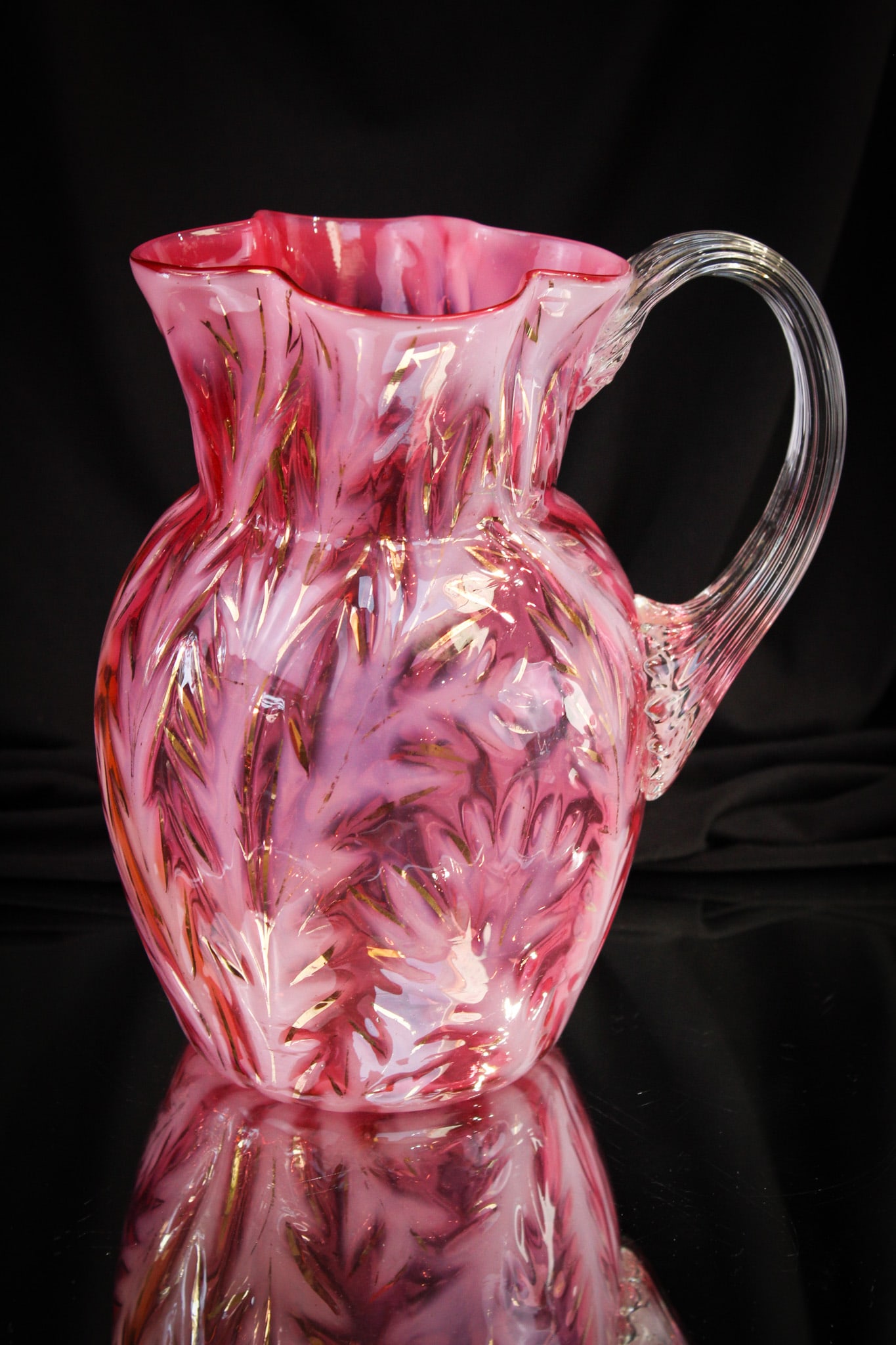 Rare Cranberry Opalescent Victorian Glass Scottish Moor Gilt Pitcher: Amazing and a rare find folks! This beautiful pitcher in the "Scottish Moor" pattern is a tough find in any form or color. This one being the pitcher is exceptionally desirable especially with the gil