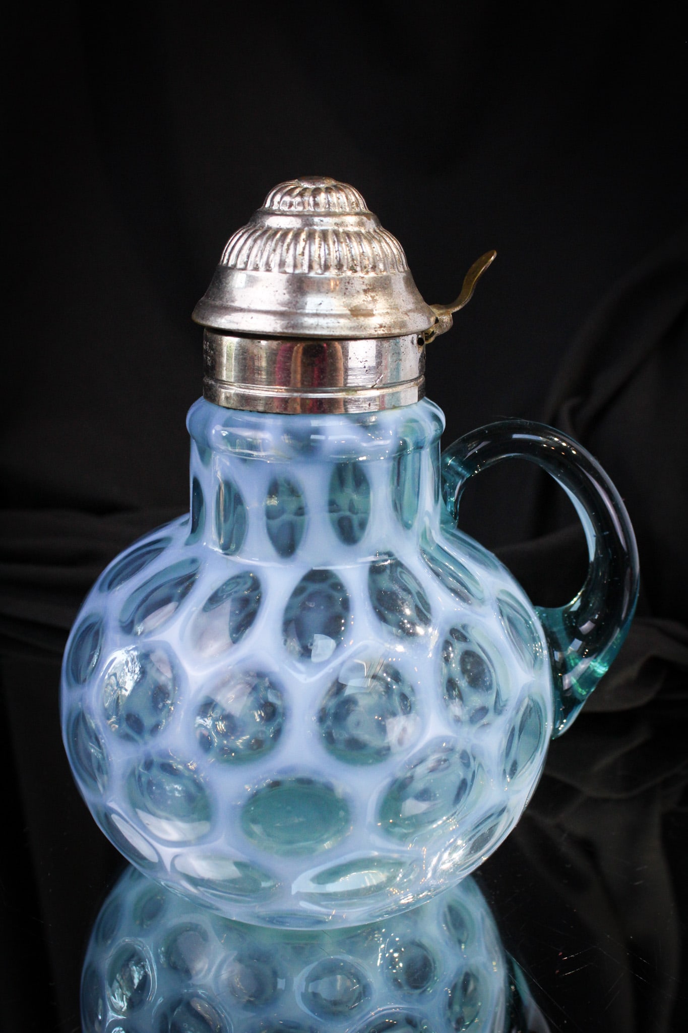 Blue Opalescent Honeycomb Syrup Pitcher: Always tough to find and this one is no exception. This syrup in blue opalescent "Honeycomb" pattern is a super find. Bid on it today!