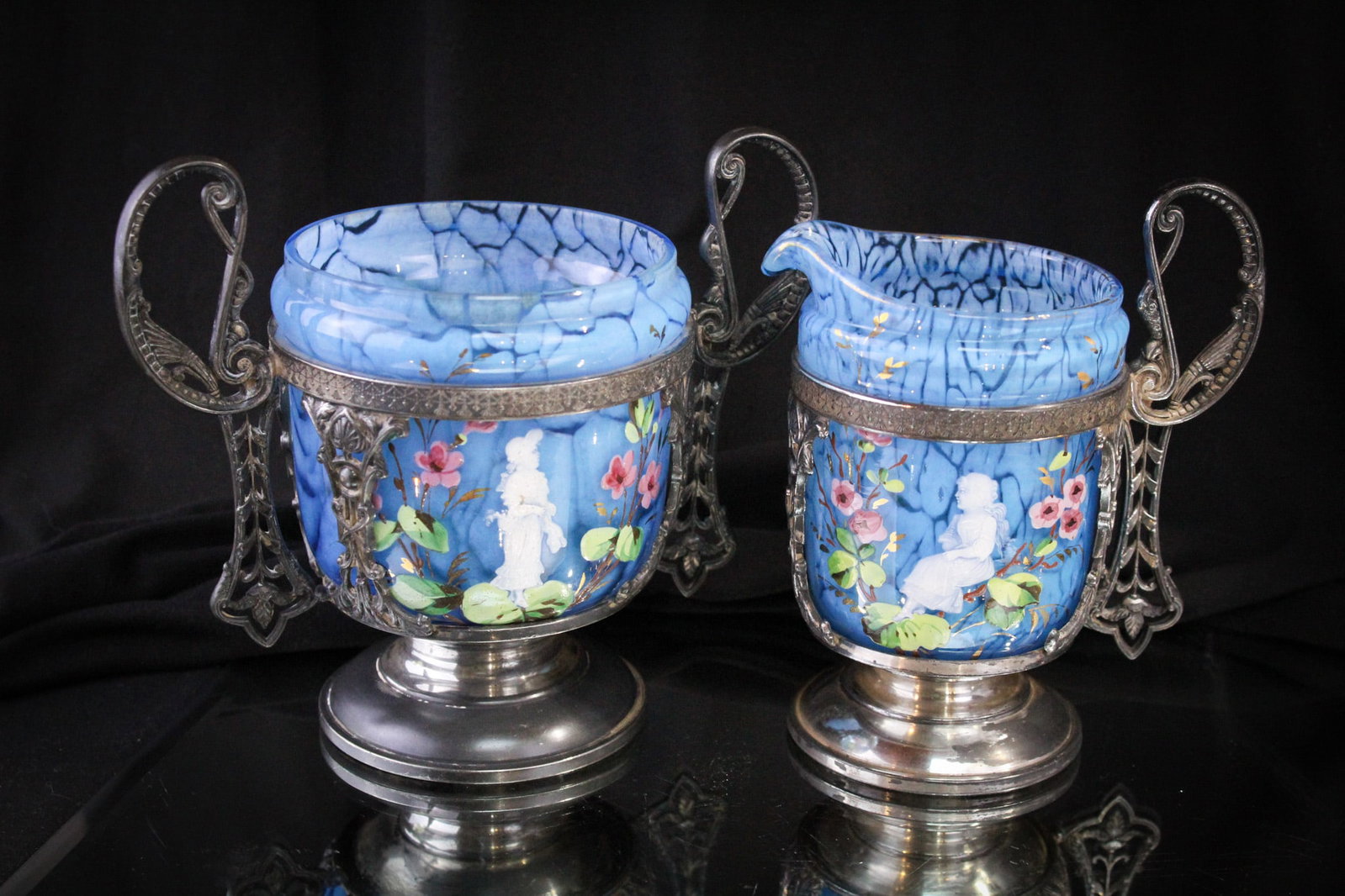 Reed & Barton Victorian Blue Spatter Mary Gregory Cramer & Sugar: Nice signed "Reed and Barton" Victorian silverplate Creamer and sugar set complete with blue cased spatter glass inserts decorated with Mary Gregory decoration.