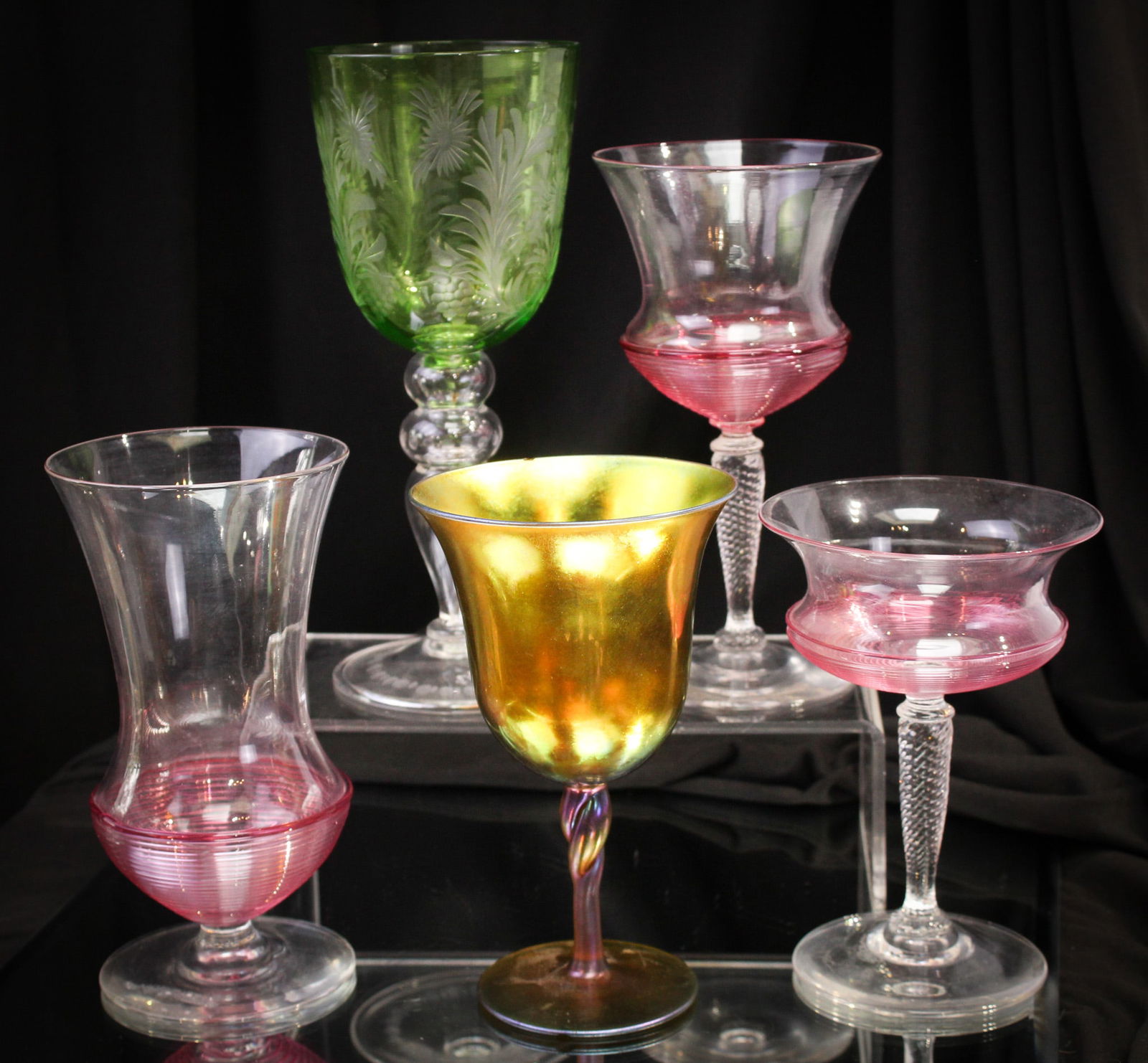 5 pc Lot Steuben Glass Goblets: Nice selection of five unique examples of Steuben goblets. Three have threading, one green wheel engraved, and one gold aurene example.