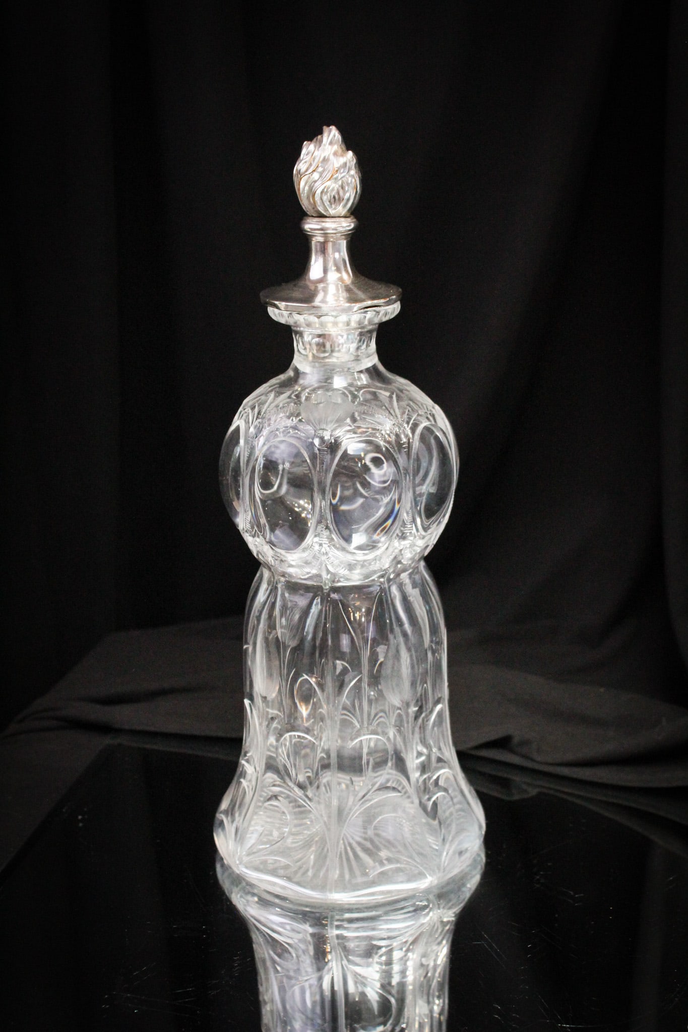 Steuben Glass #1413 Clear Engraved & Silver Decanter: Sleek form to this Steuben glass #1413 clear engraved decanter with flame form silverplate stopper. Very pretty.