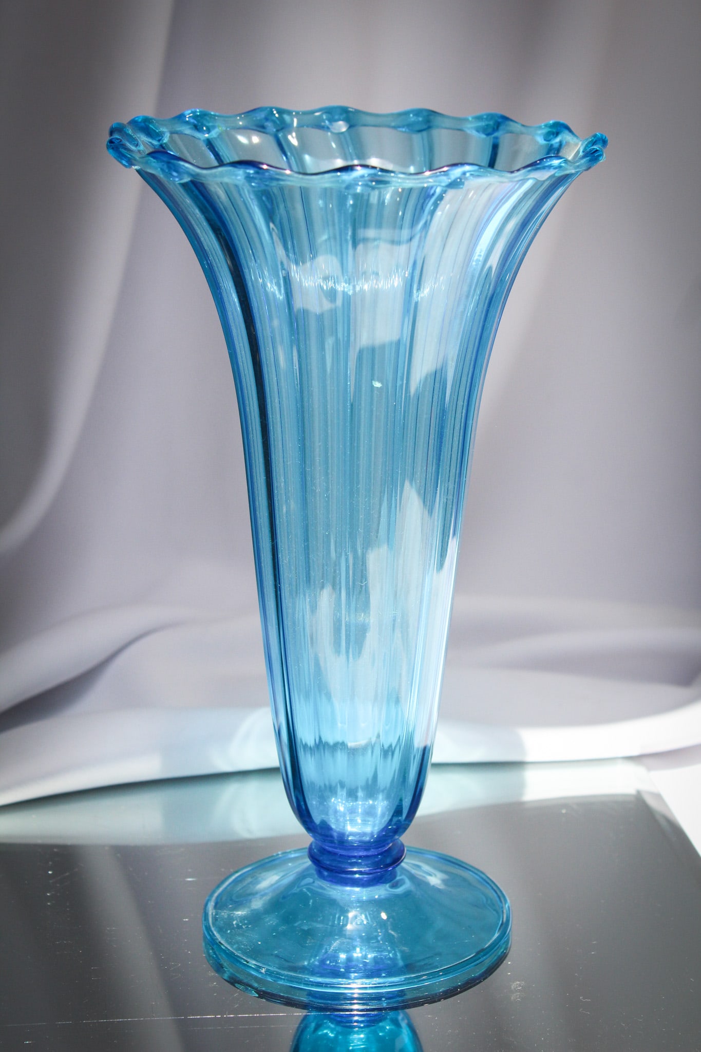 Steuben Glass #3143 Ribbed Celeste Blue Vase: Fine color and form on this Celeste Blue Steuben #3143 vase. A classic welcome addition to any colllection.