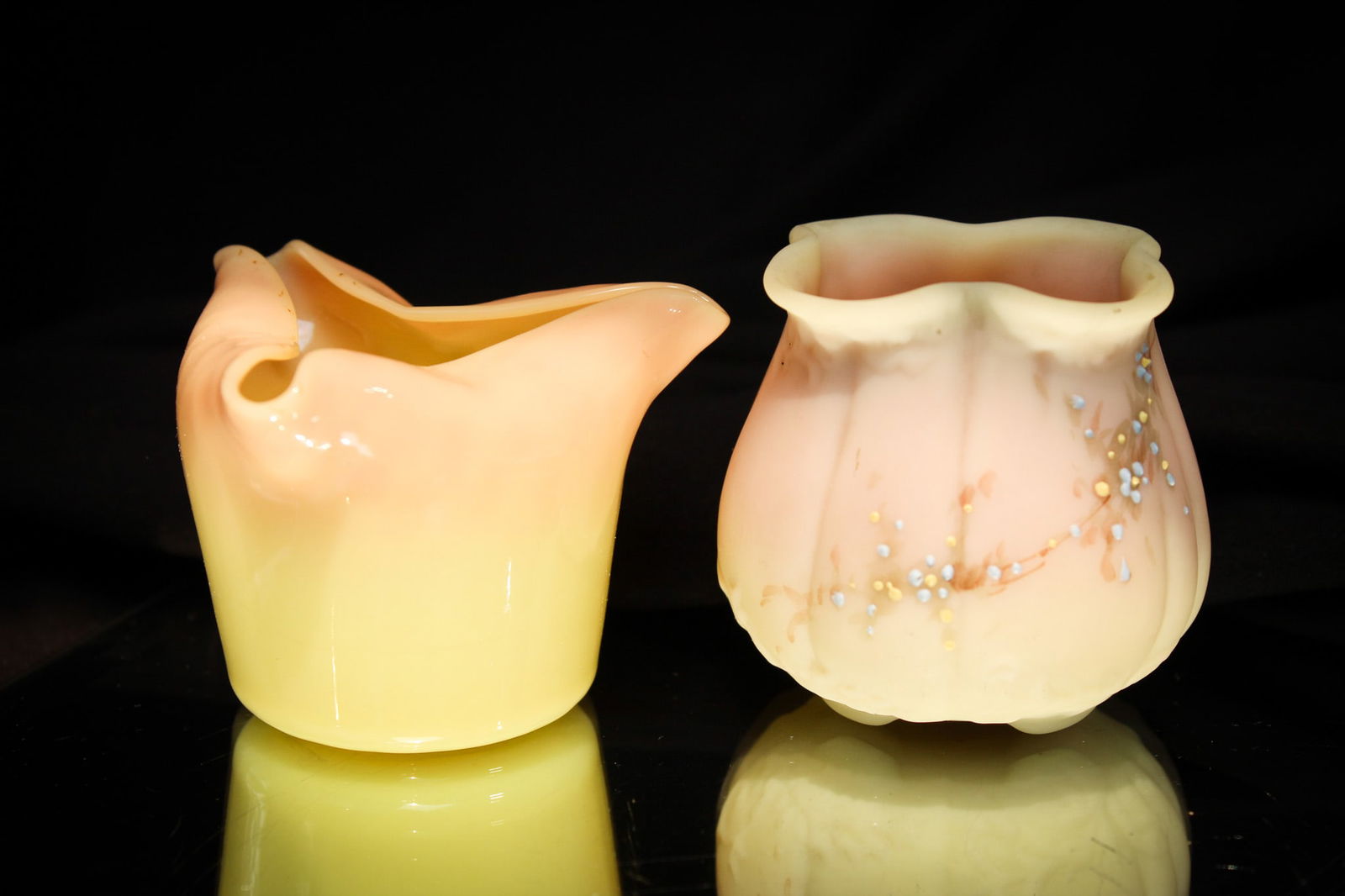 2 pc Lot Mt. Washington Victorian Burmese Toothpick Holders: Select offering here of two fine examples of Mt. Washington glass toothpicks. One a tri-corner glossy glass burmese paired with the other being a burmese "Simple Scroll" example. Nice!