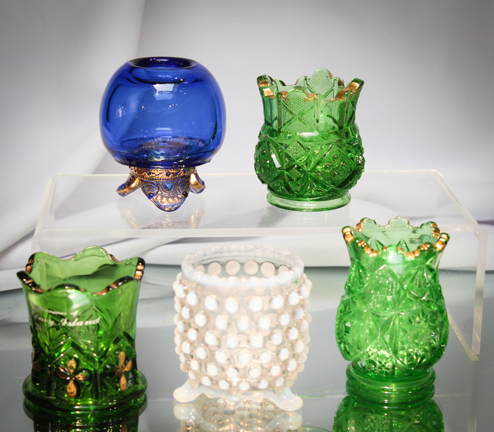 5 pc Lot Victorian Glass Toothpick Holders: Nice offering in this lot of five Victorian toothpick holders. Each unique in design and pattern. Something sure to please the Pickie in your life!