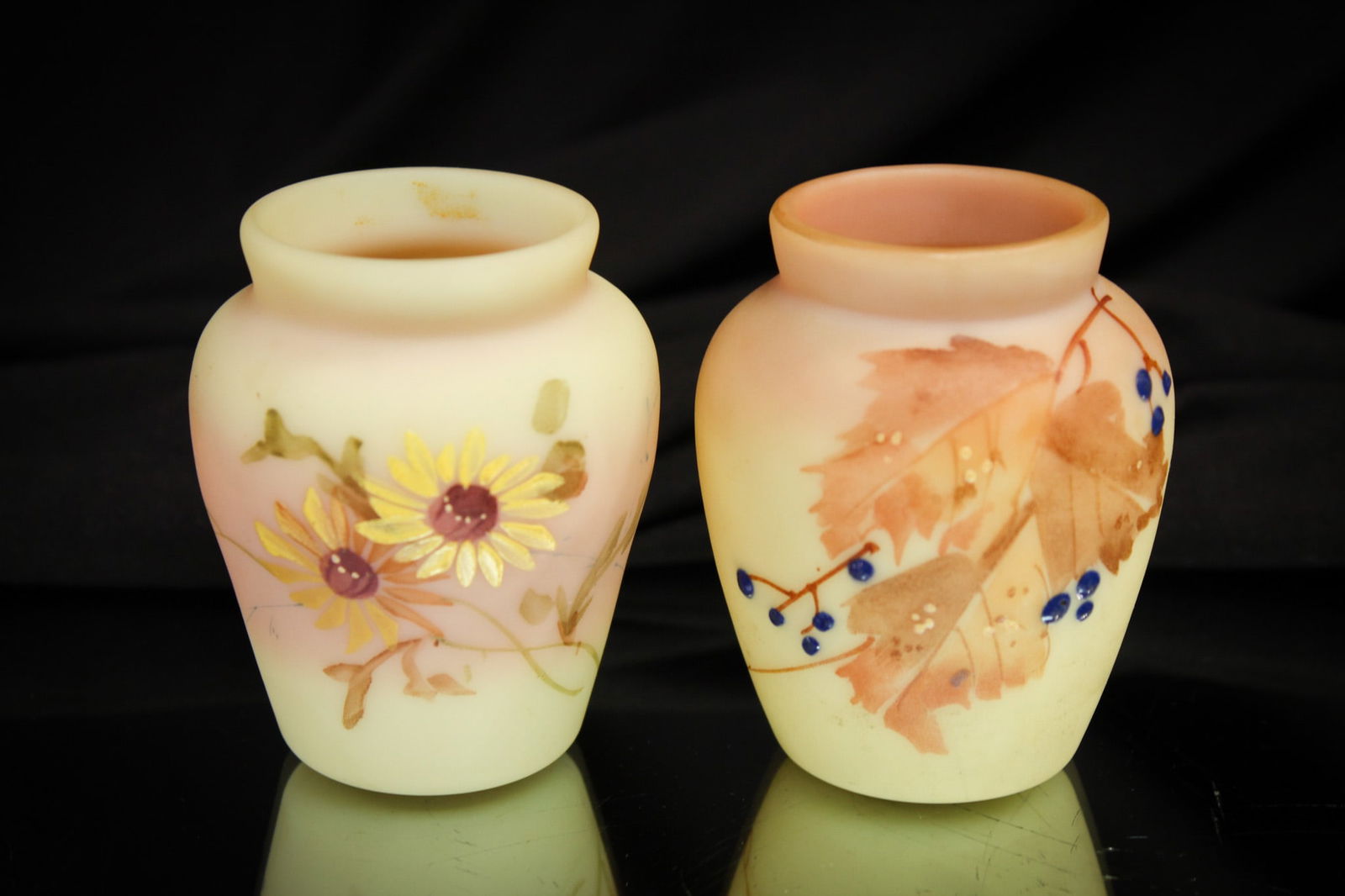 2 pc Lot Burmese Urn Mt. Washington Toothpick Holders: Select offering of two great examples of Mt. Washington burmese glass "Urn" form toothpick holders with unique decoration to each.