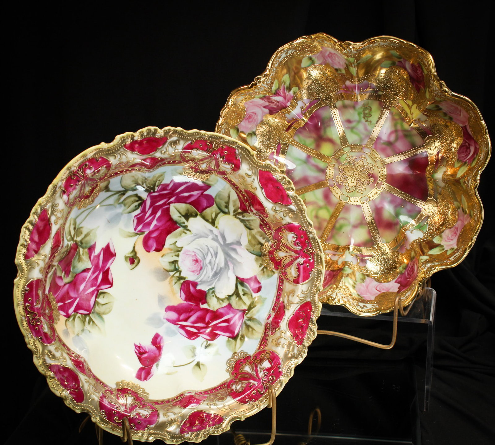 2 pc Lot Nippon Porcelain Bowls Roses & More: Select offering here of two fine examples of Nippon porcelain. Both quite nice examples. One signed, one unsigned. Both with a bounty of roses and gold. Largest measures 3 3/4" by 11".