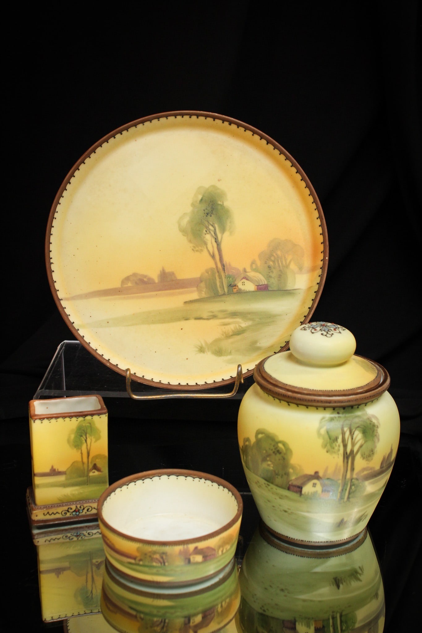 Signed Nippon Porcelain Matte Smoking Set: Great find here folks! This signed "Nippon" porcelain smoking set is complete and has super matte finish scenic decoration. Set consists of a humidor, match holder, ashtray, and tray. Nice!