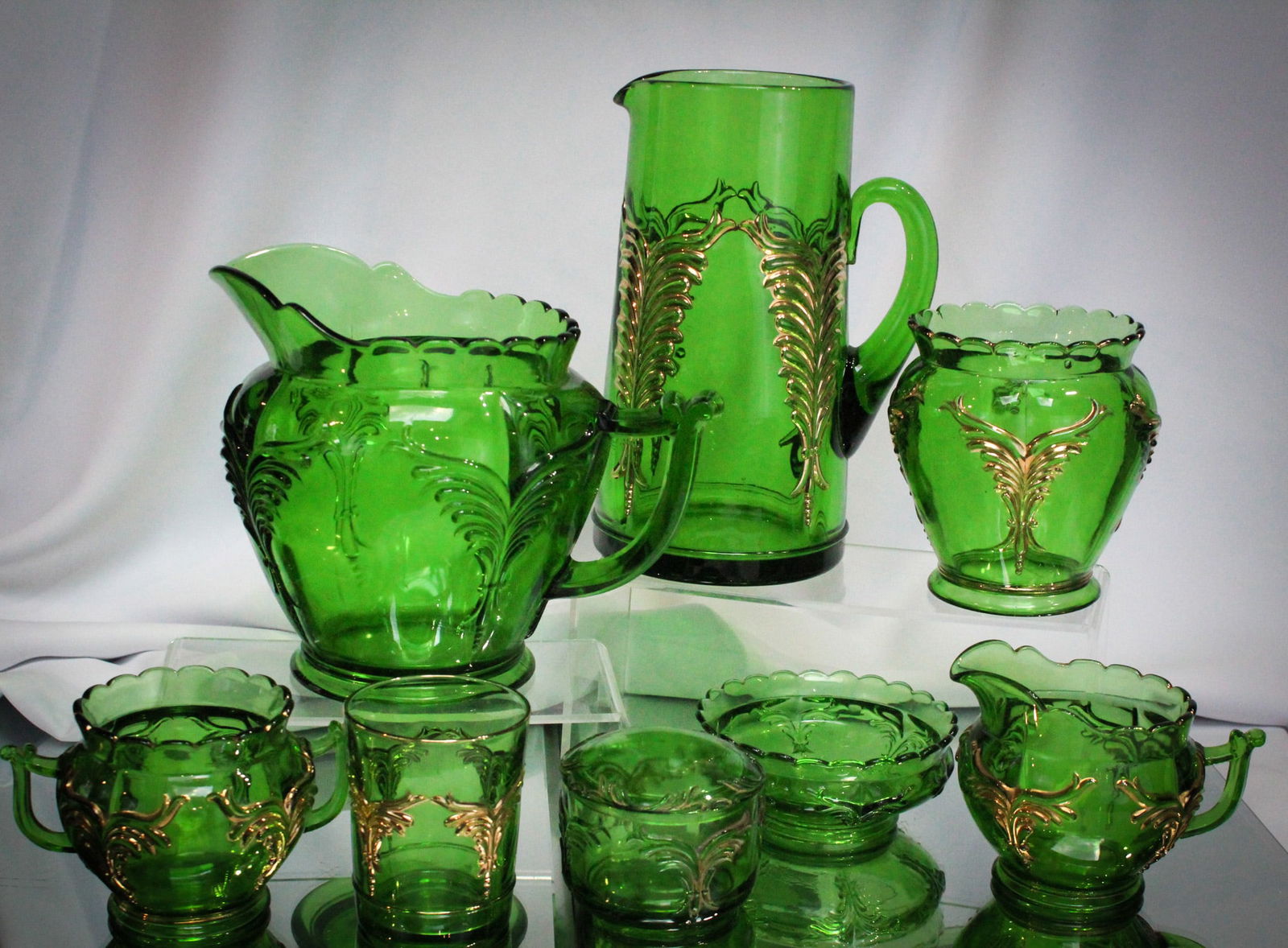 8 pc Lot Heisey Glass Victorian Winged Scroll: Super offering of Heisey "Winged Scroll" pattern in this mega Magnum Auctions lot of eight fineries. Lot is comprised of some gilt and not gilt examples.