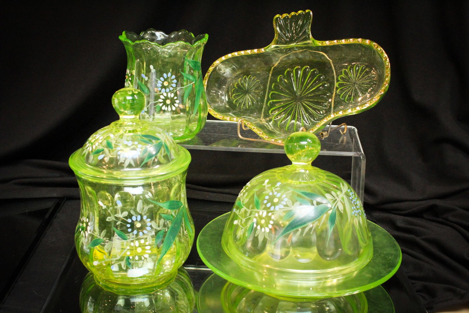 4 pc Lot Inside Rib Vaseline Enameled Glass: Selections in the "Inside Rib" pattern in this fine offering. Items include a butter, sugar, spooner, and a tray.