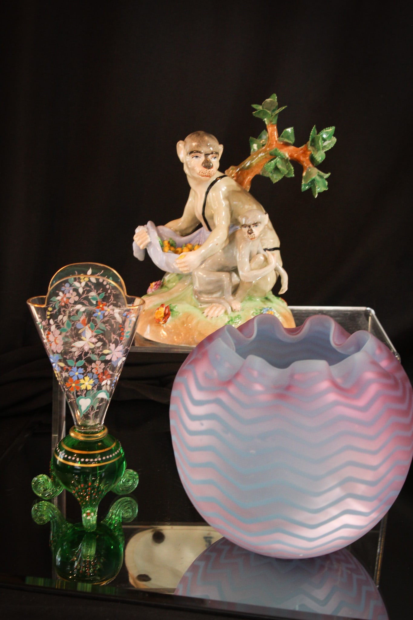3 pc Lot Dresden Monkey Figurine Rose Bowl & More: Three hand selected articles in this fine offering. A Dresden figural Monkey porcelain figurine. An Italian mother of pearl satin glass rose bowl, and a whimsy vase with applied feet and enameled deco