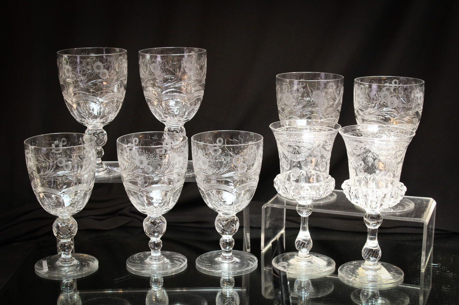 9 pc Lot Signed Webb Glass Cut Engraved Crystal Stems: Fabulous Lot of 9 cut engraved crystal stems by "Webb" glass. Lot includes 7 water goblets and two wine stems.