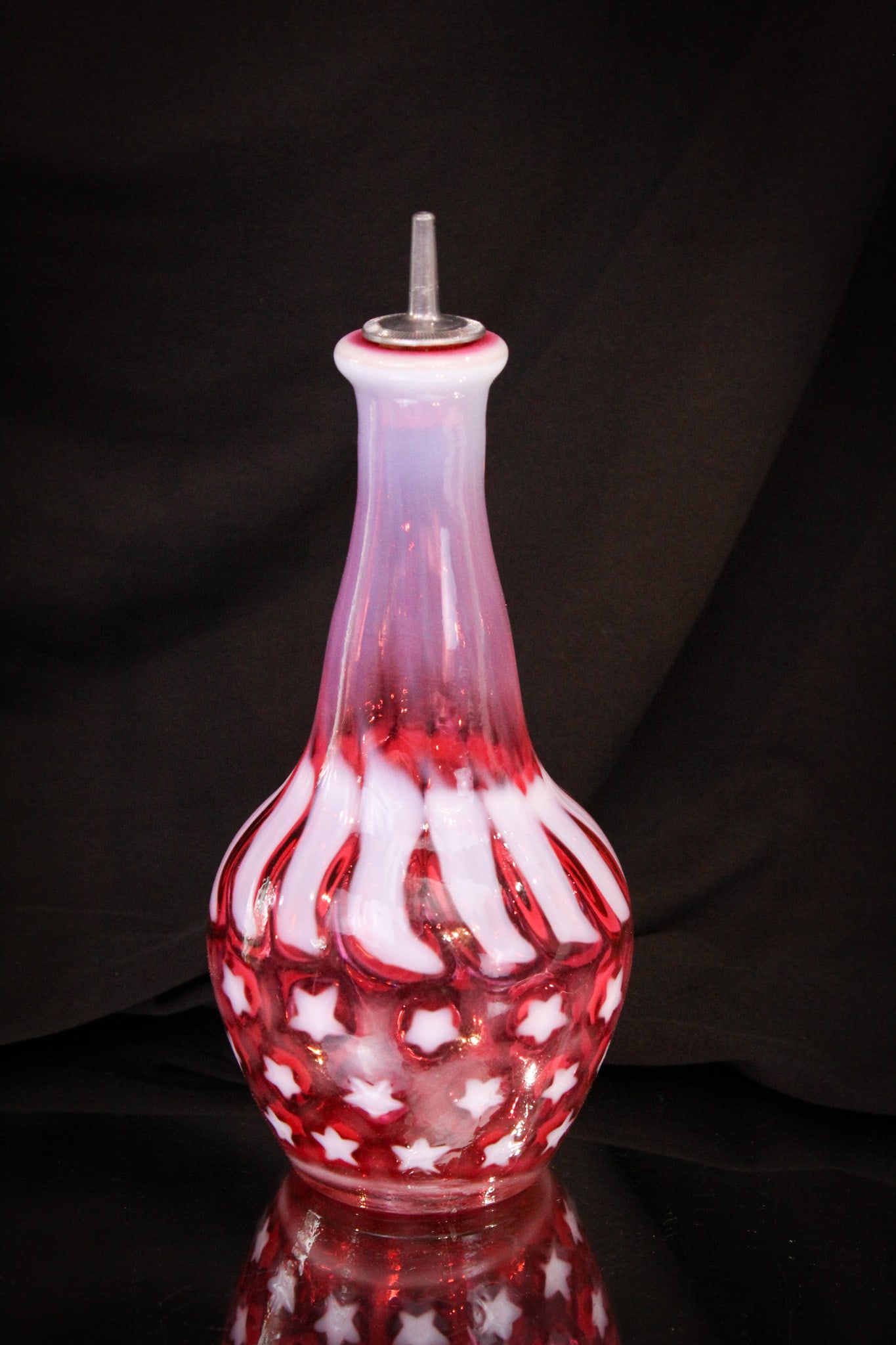 Fenton LG Wright Cranberry Opalescent Stars & Stripes Barber Bottle: Nice color and opalescence make up this lovely barber bottle. Getting tougher to find!