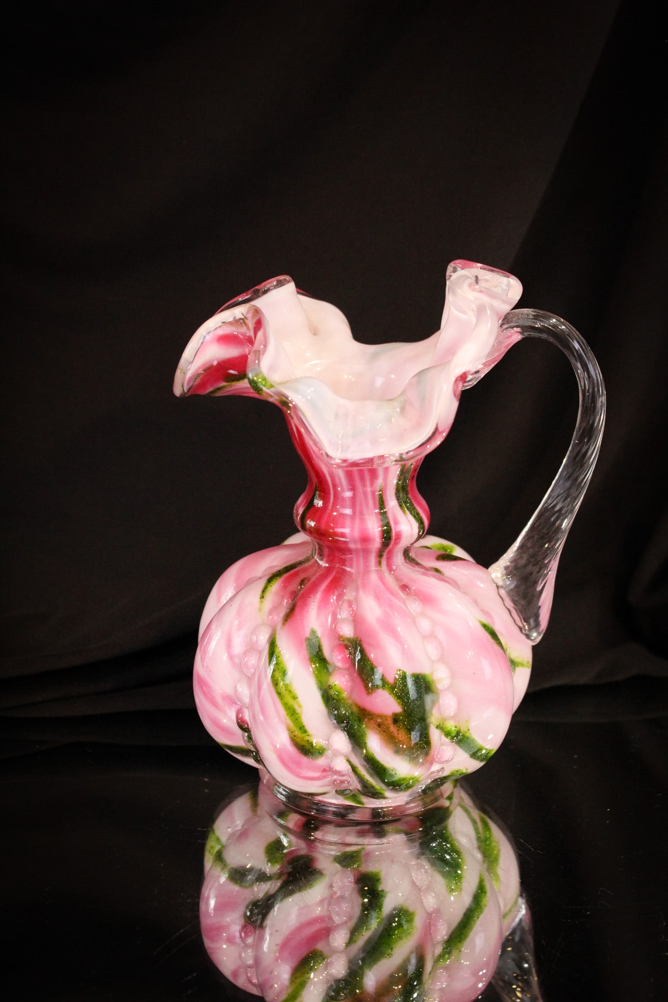 Sample pc of Fenton Art Glass: Great when you can add a piece like this to your collection. This lovely sample exmple is Vasa Murrhina in the beaded melon pattern in the form of a ewer. Bid now before you lose it.
