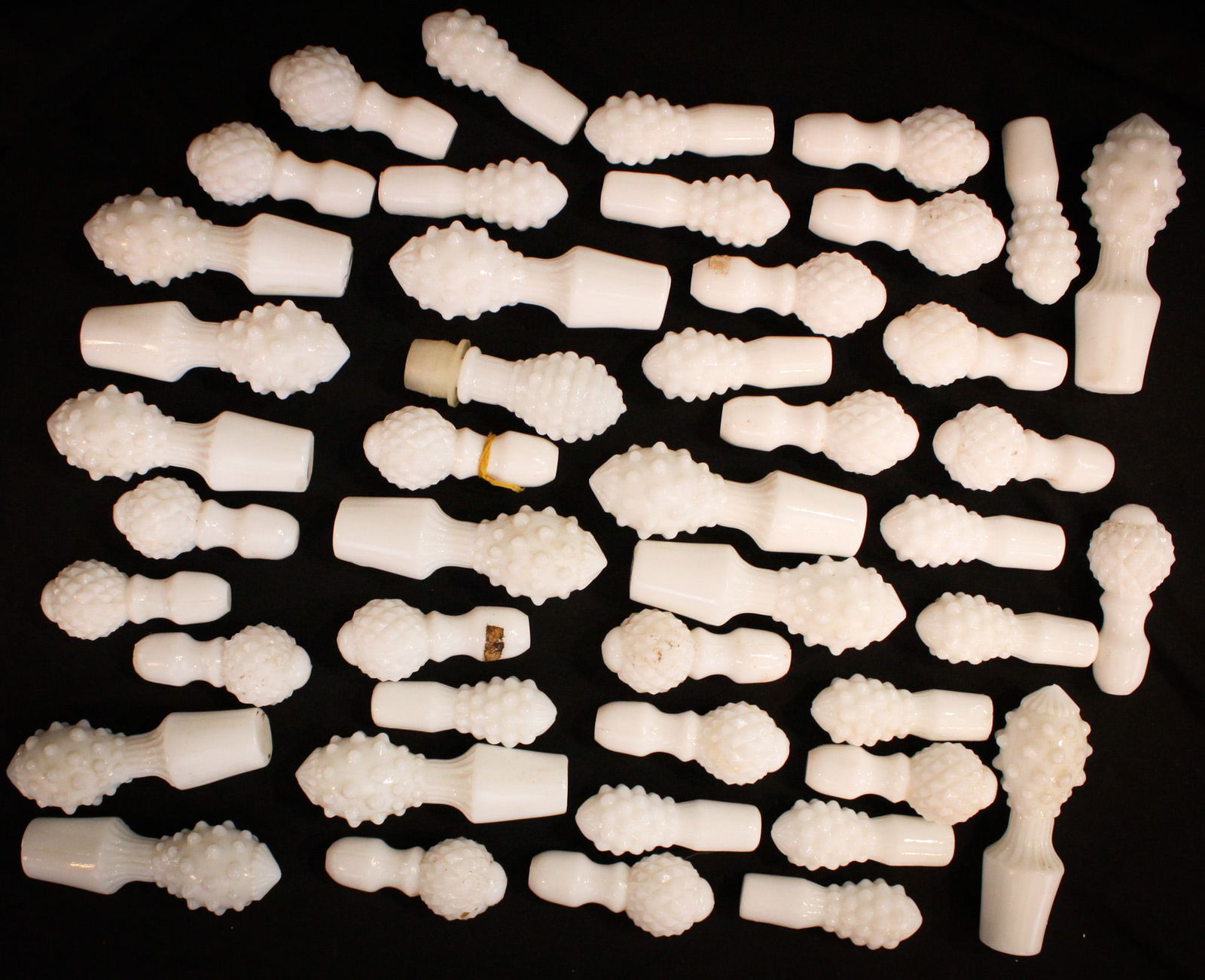 45 pc Lot Fenton Art Glass Milk Glass Hobnail Stoppers: Great offering of seldom found Fenton & more milk glass hobnail stoppers.