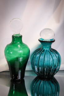 2 pc Lot Blenko Glass Decanters: Great offering of two unique Blenko glass decanters. One in lobed form teal and the other spruce green.