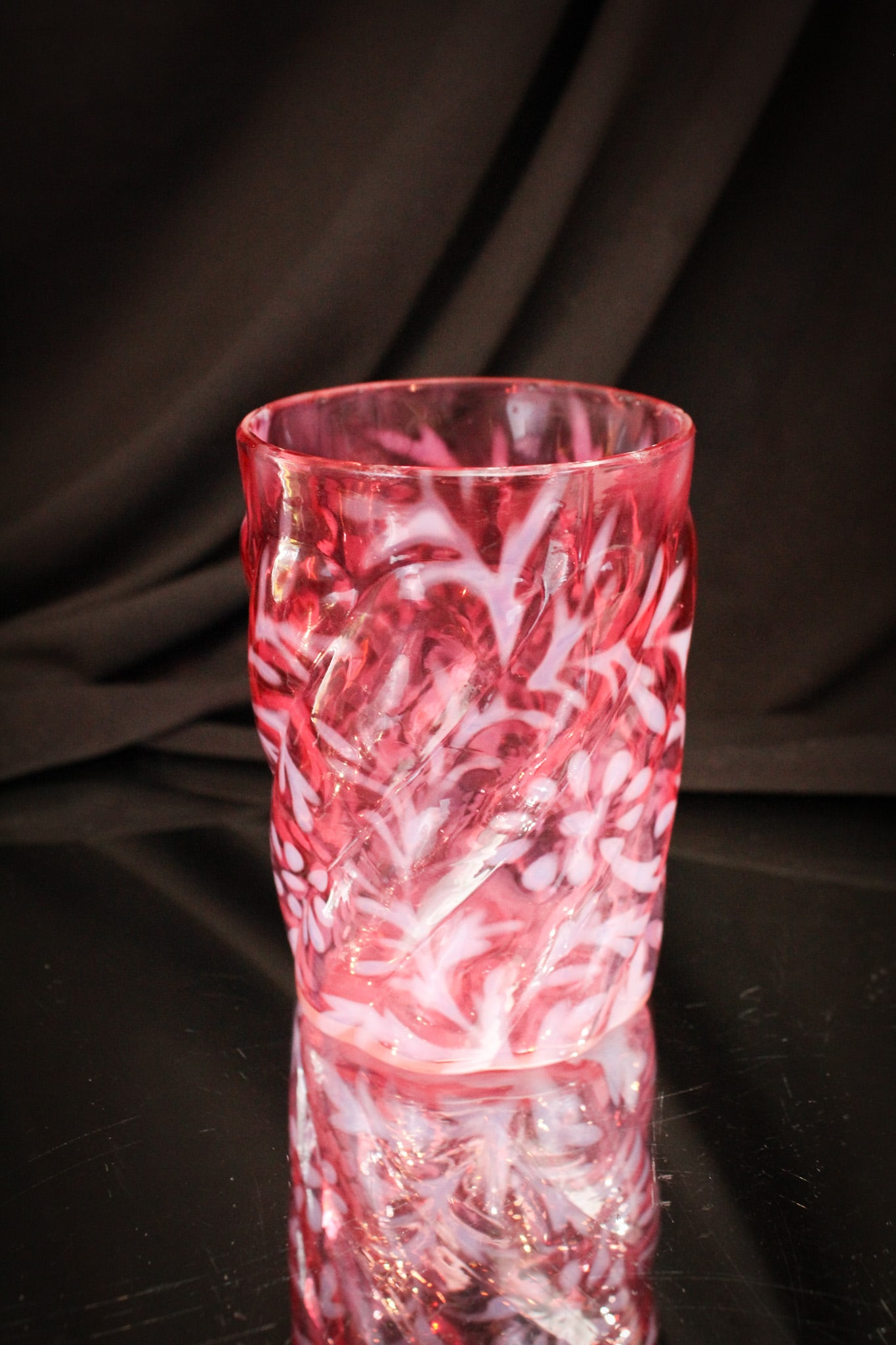 Scarce Northwood Daisy & Fern Parian Swirl Mold Victorian Tumbler: Tough to find if you need it, folks! This is a cranberry Parian Swirl mold tumbler with opalescent Daisy and Fern pattern. Don't show up often at all, we dare say!