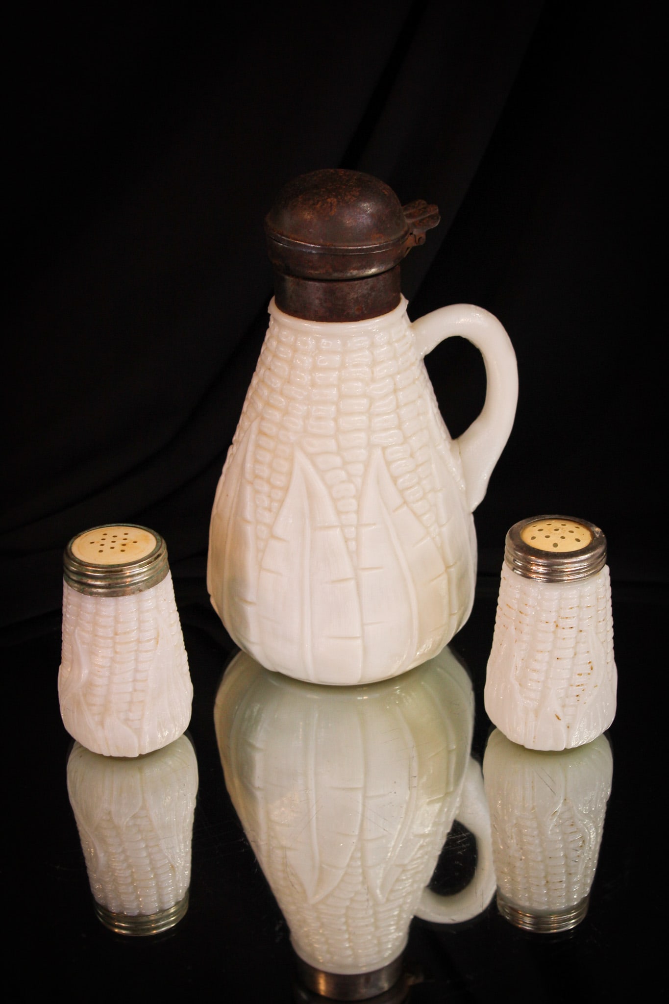 3 pc Lot Scarce Corn with Husk Victorian Shakers & Syrup Pitcher: Nice trio offering of a Corn with Husk milk glass syrup pitcher and matching shakers from the Victorian period.