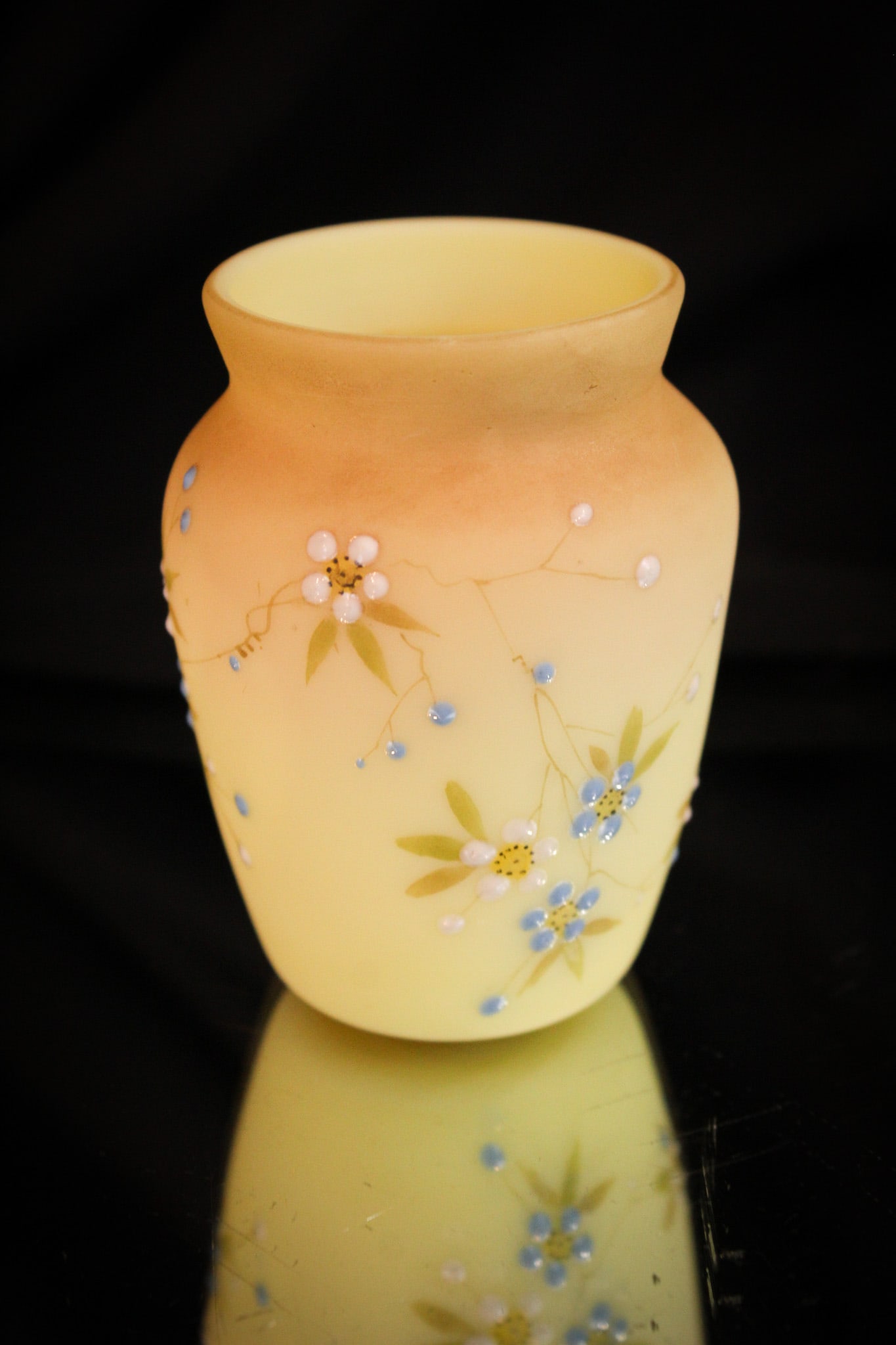 Mt. Washington Burmese Glass Urn Victorian Toothpick Holder: Blue and white florals abound on this lovely little gem of a Victorian toothpick holder. Base glass is beautiful burmese. Who could ask for more?