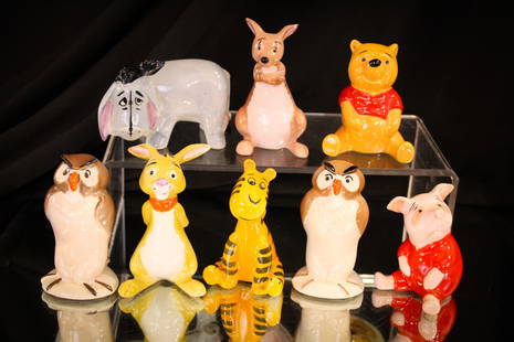 8 pc Beswick Walt Disney "Winnie the Pooh and Friends" Porcelain Figurines: Great offering of Beswick Porcelain "Winnie the Pooh and Friends" figurines. Lot is comprised by Winnie and Rabbit, 2 Owls, Kanga, Tigger and Eeyore.