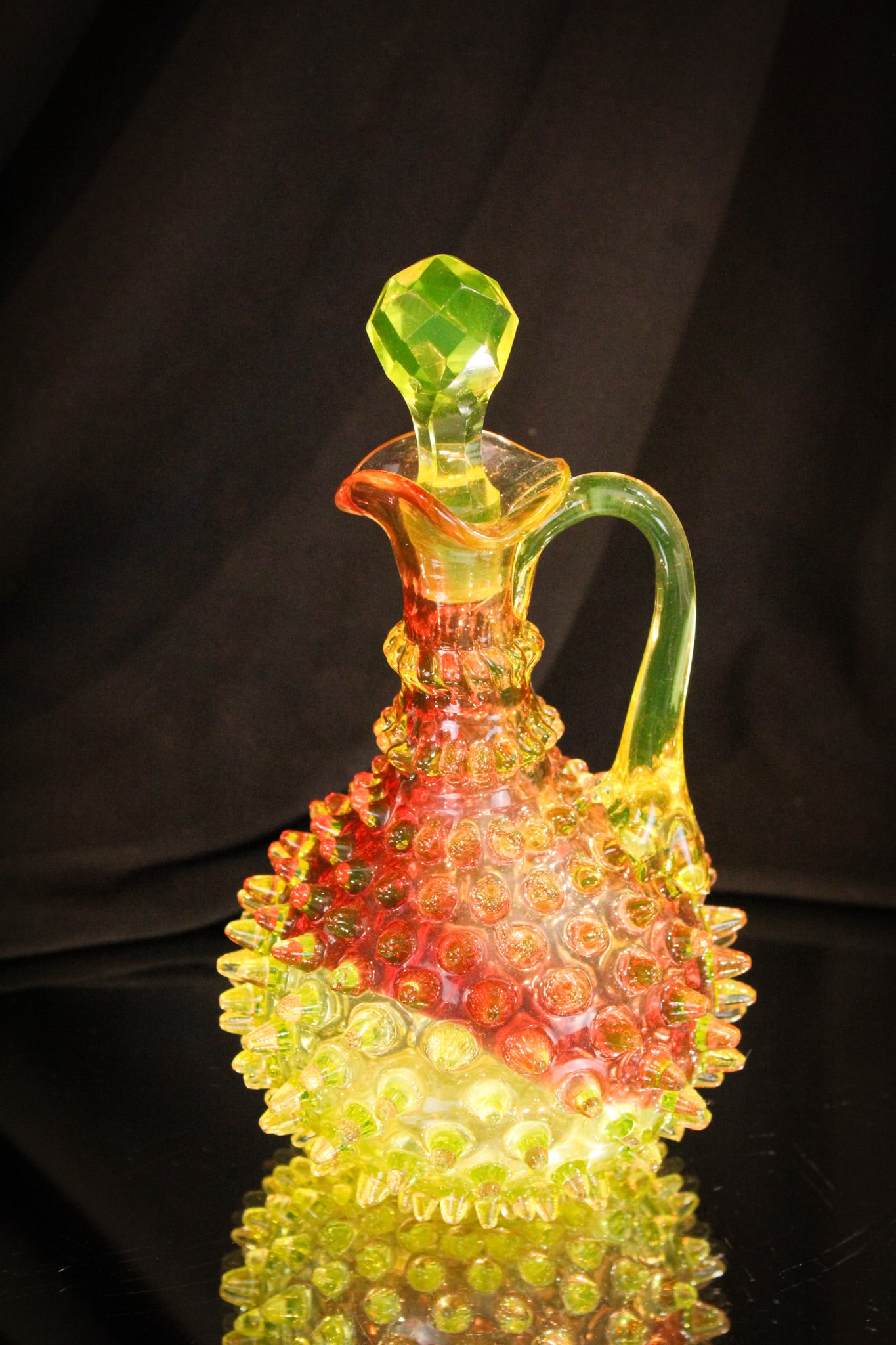 Hobb's Hobnail Cranberry Vaseline Rubina Verde Victorian Glass Cruet: Another fine offering in our Hobb's line up is this cranberry to vaseline hobnail Victorian glass cruet. Great color on this fine piece.