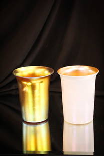 2 pc Lot Steuben Glass Tumbler Gold Aurene & Calcite: Two fine examples of Steuben tumblers paired together for your bidding pleasure. An all Gold Aurene example along with a Gold Aurene on Calcite example. Aurene example marked, "Aurene."